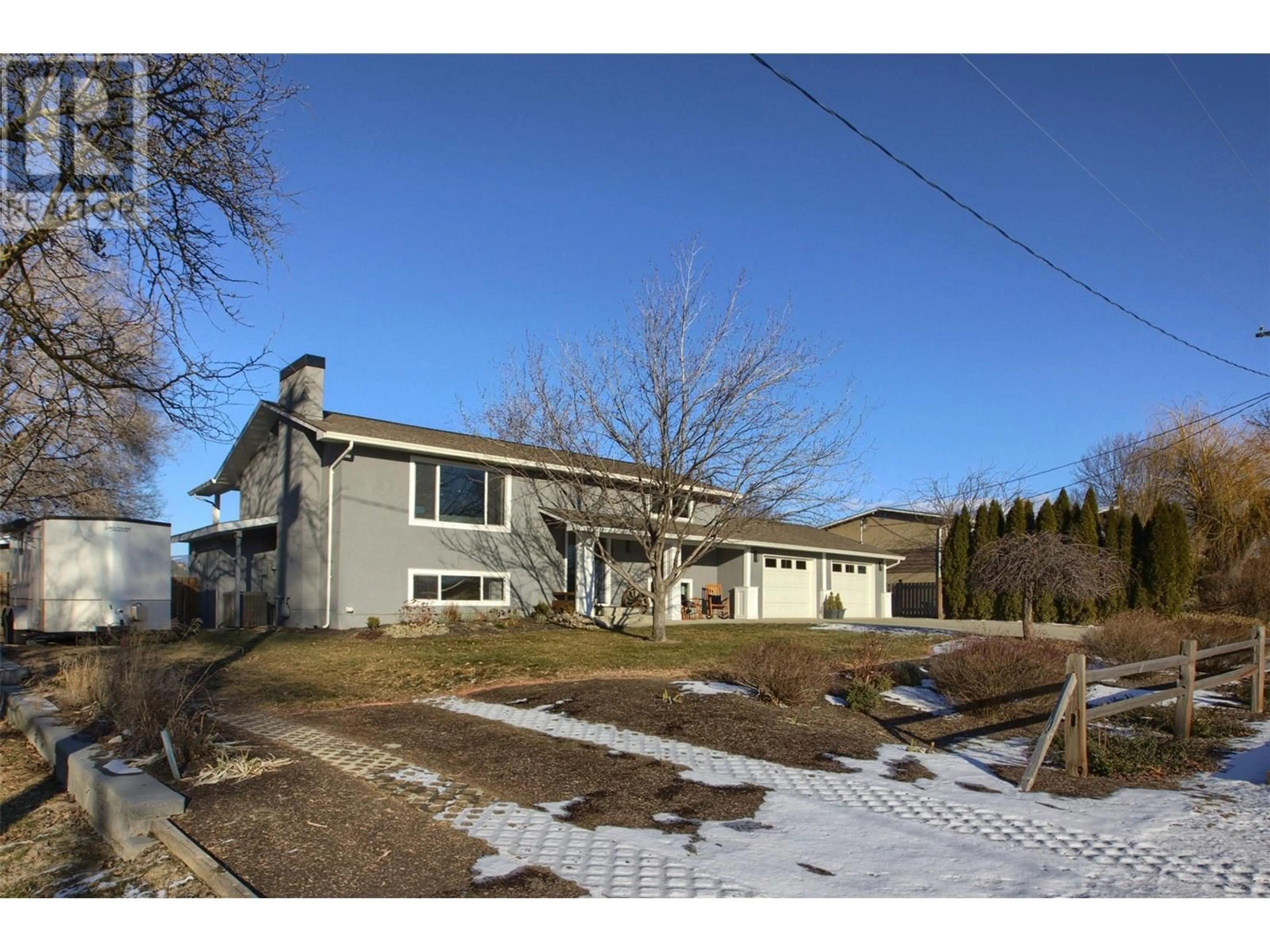 A pic from outside/outdoor area/front of a property/back of a property/a pic from drone, street for 1824 Kerr Road, Kelowna British Columbia V1V1X2