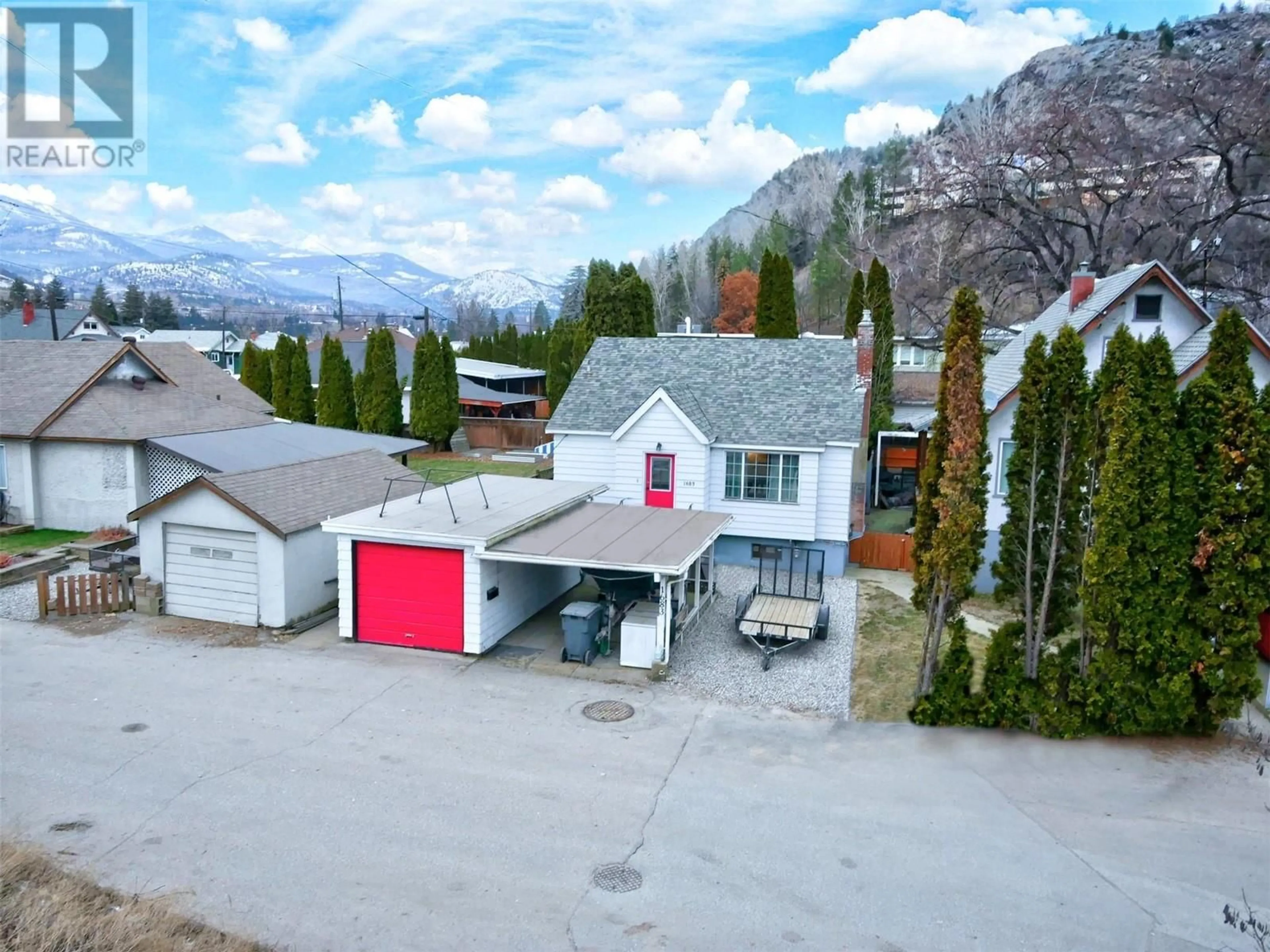 A pic from outside/outdoor area/front of a property/back of a property/a pic from drone, mountain view for 1683 Bailey Street, Trail British Columbia V1R1W5