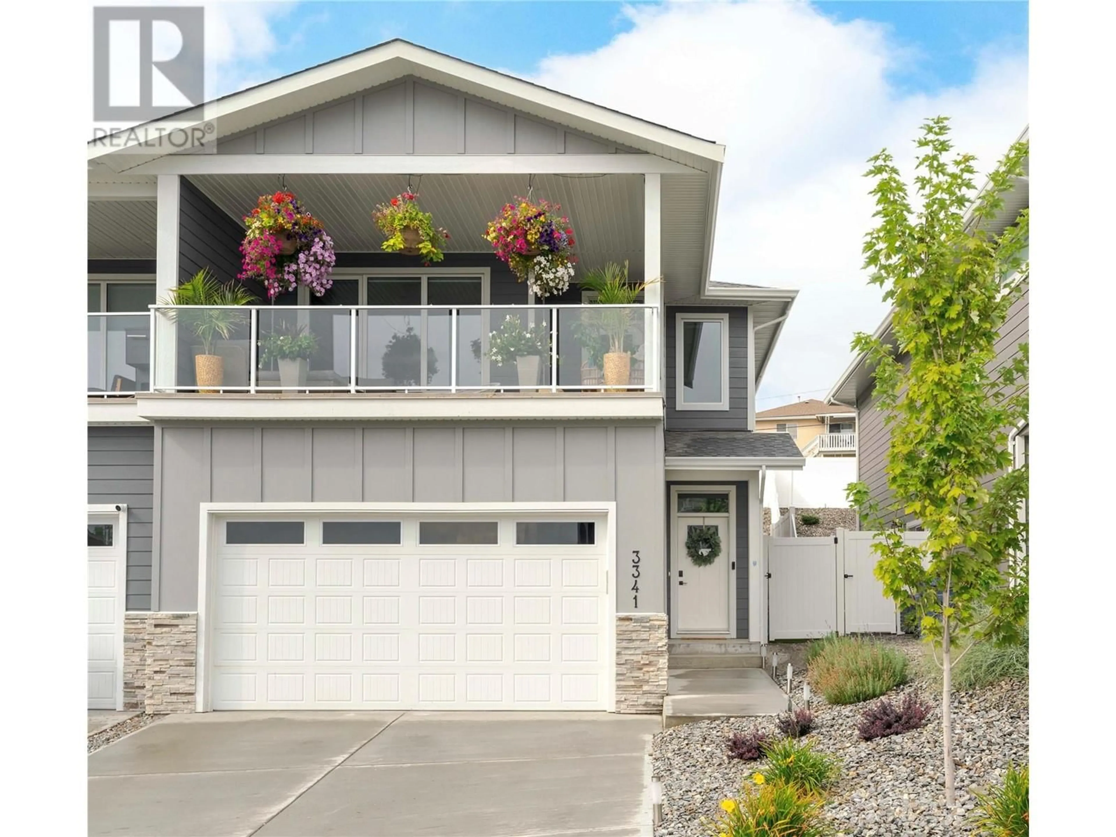 Home with vinyl exterior material, street for 3341 Hawks Crescent, West Kelowna British Columbia V4T1A7