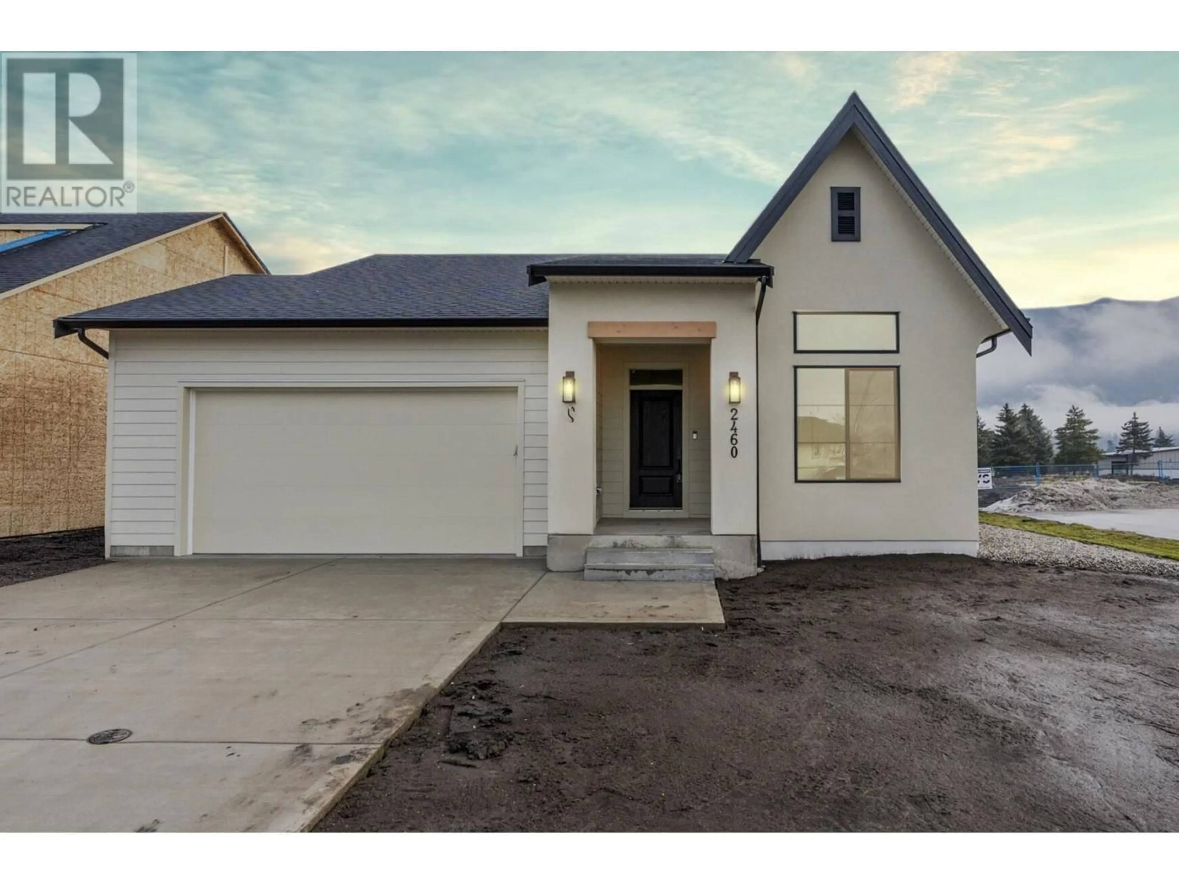Home with brick exterior material, street for 2460 BRADLEY DRIVE, Armstrong British Columbia V4Y0Y4