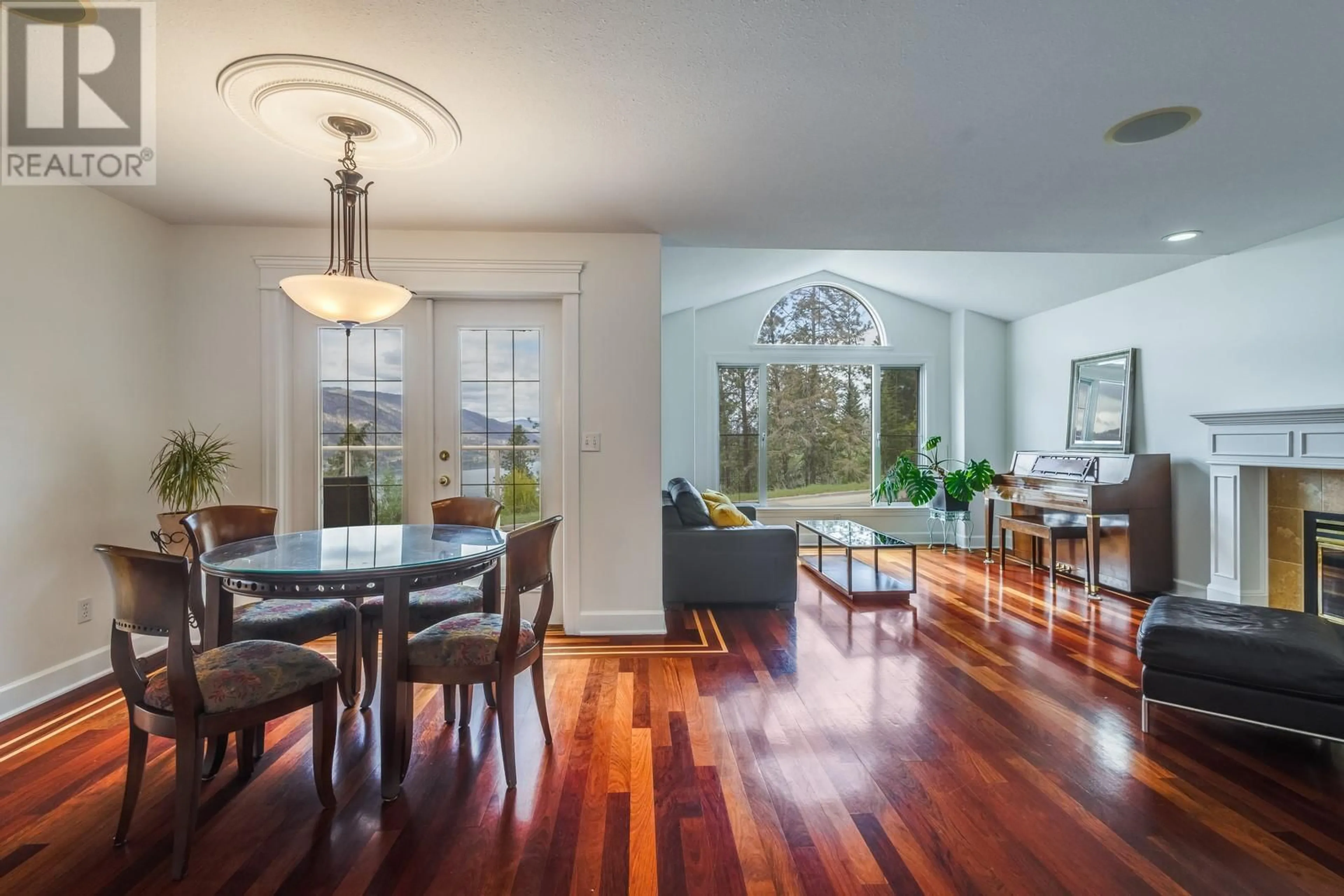 Dining room, wood/laminate floor for 157 MAGIC DRIVE, Kelowna British Columbia V1V1N2