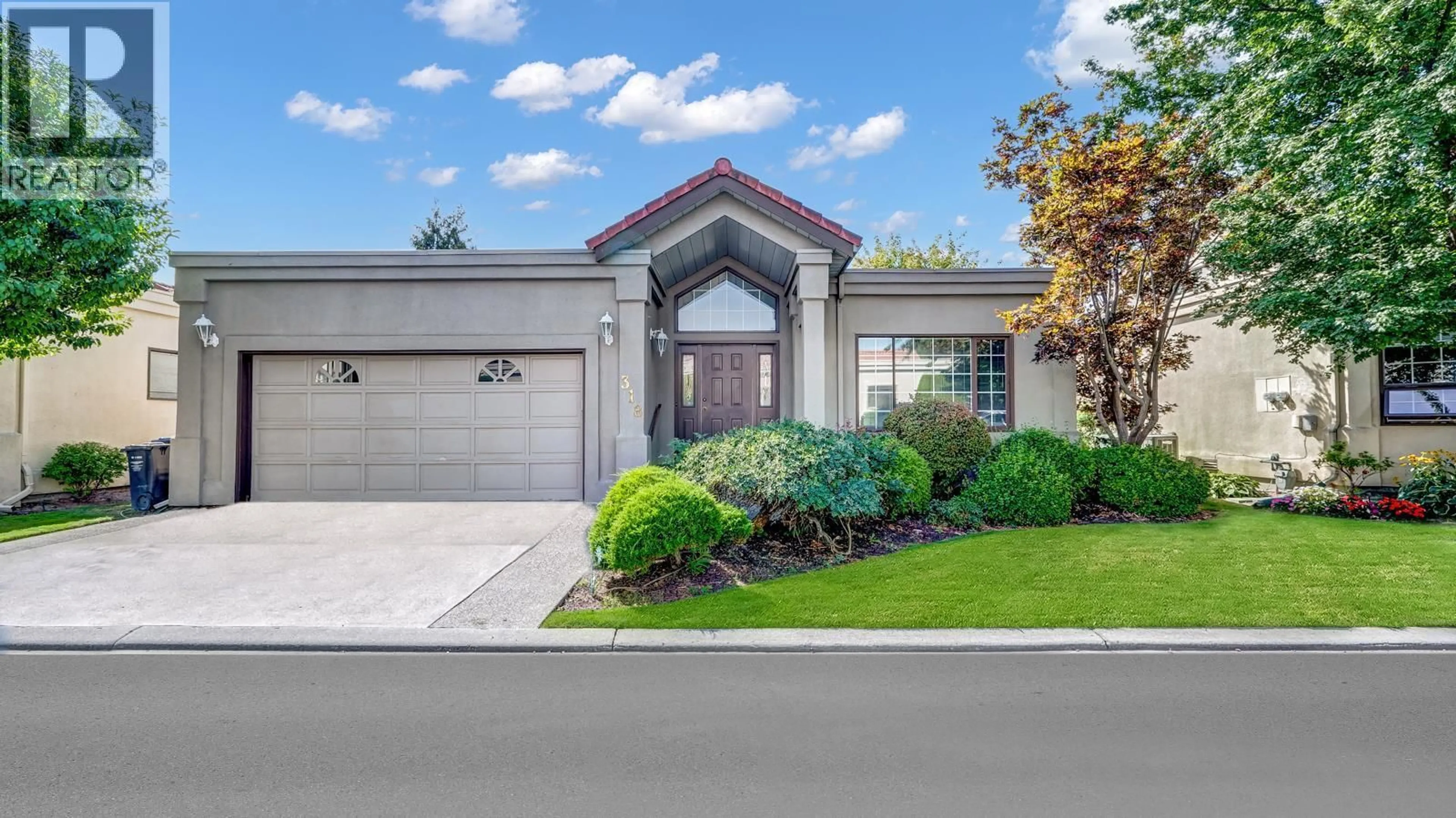 Home with brick exterior material, street for 318 - 650 LEXINGTON DRIVE, Kelowna British Columbia V1W3B6