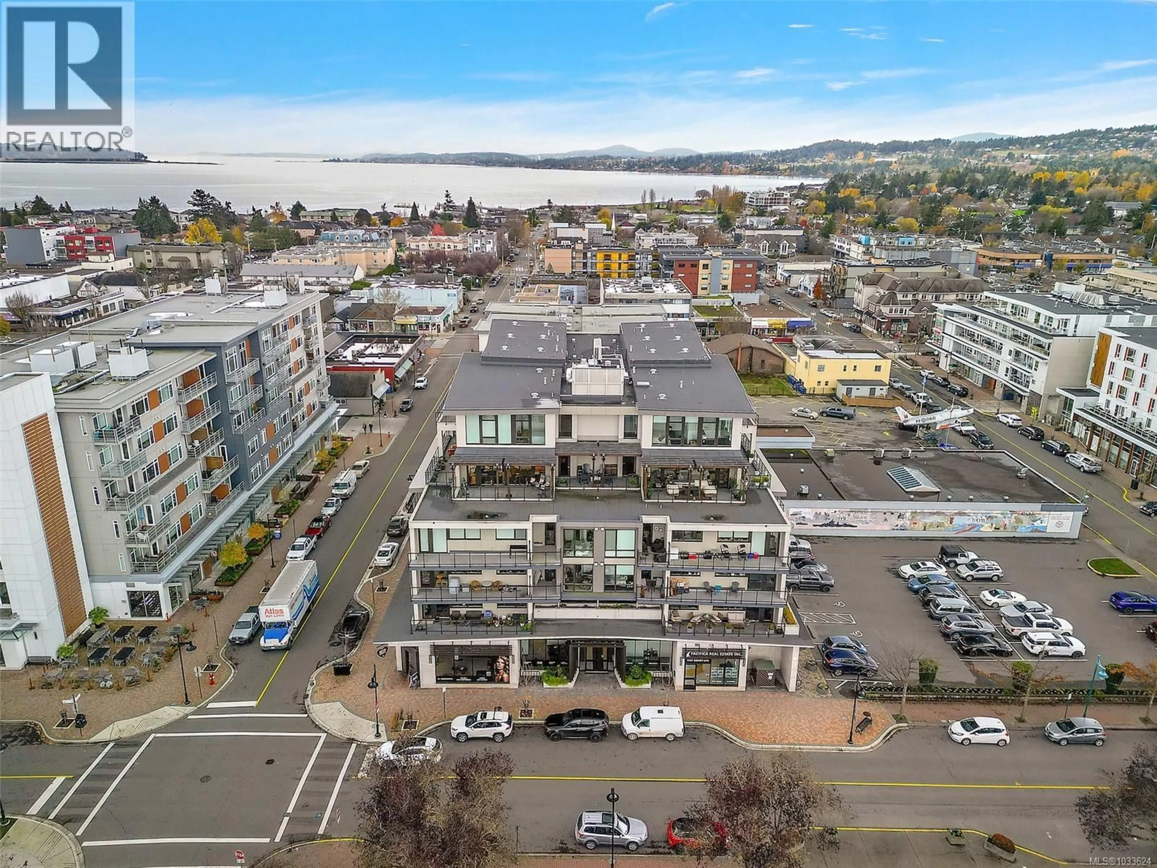 A pic from outside/outdoor area/front of a property/back of a property/a pic from drone, city buildings view from balcony for 203 - 2461 SIDNEY AVENUE, Sidney British Columbia V8L1Y8