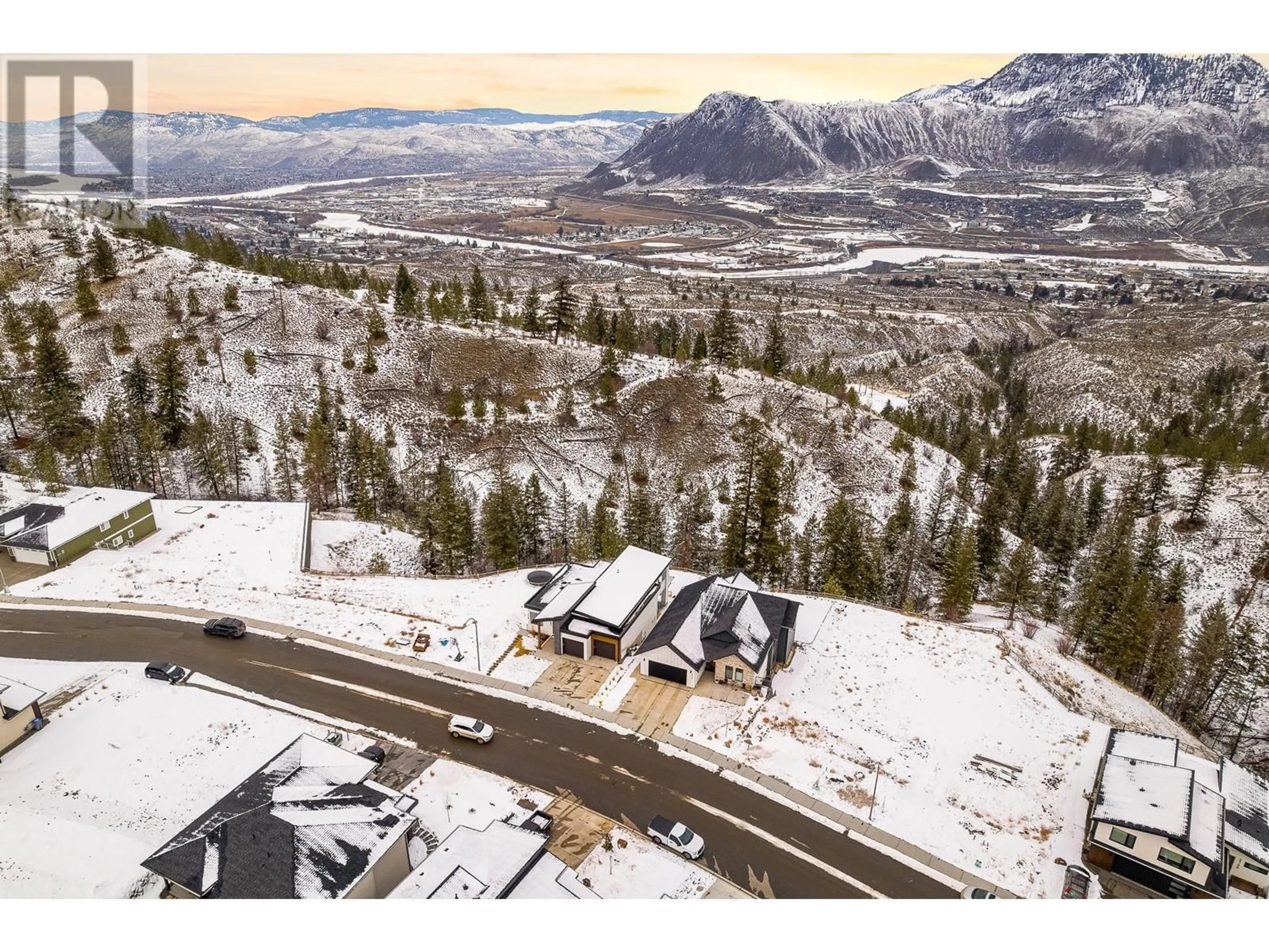 A pic from outside/outdoor area/front of a property/back of a property/a pic from drone, mountain view for 2182 Galore Crescent, Kamloops British Columbia V2E0E4