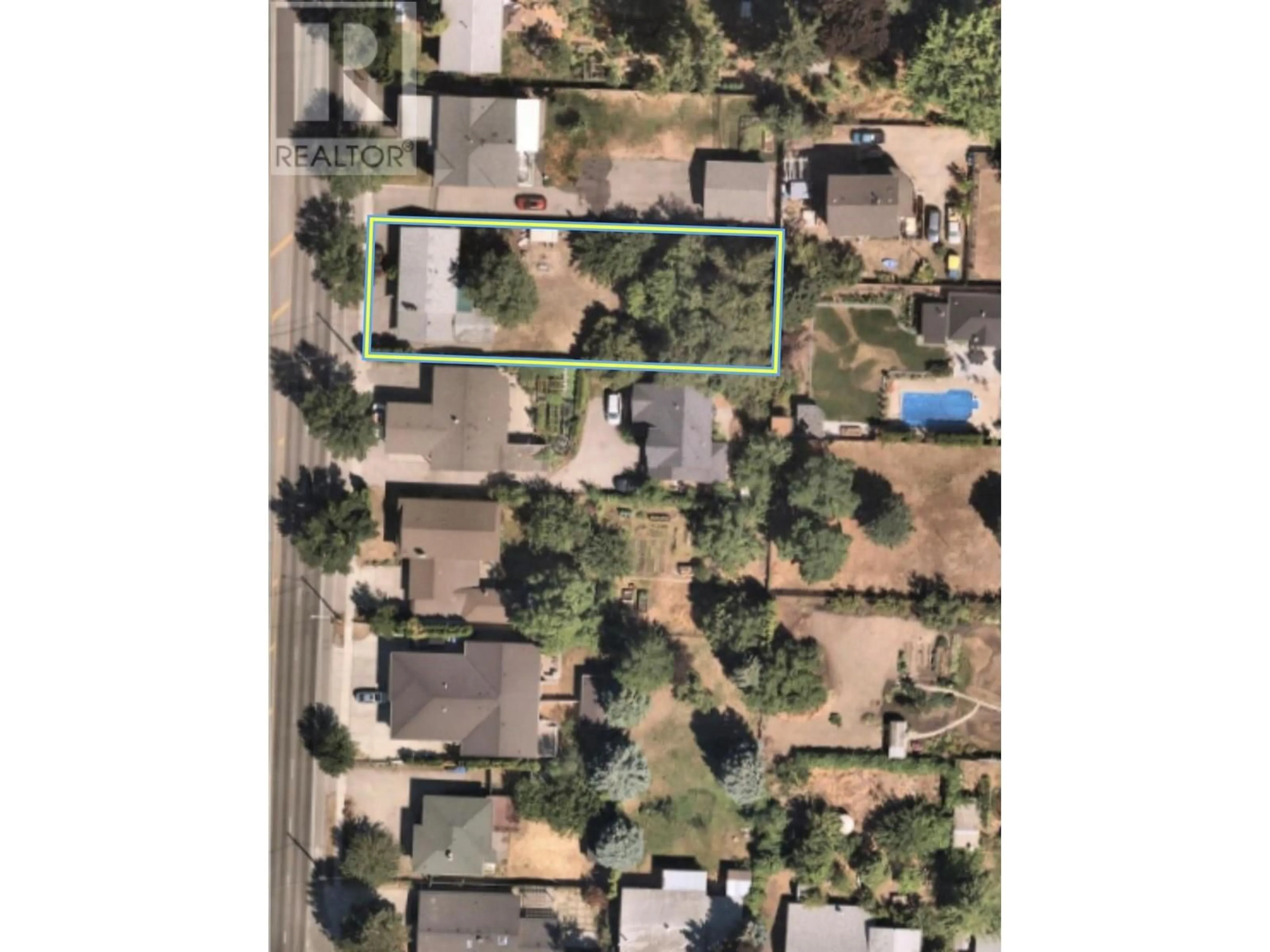 A pic from outside/outdoor area/front of a property/back of a property/a pic from drone, street for 3049 Gordon Drive, Kelowna British Columbia V1W3R1