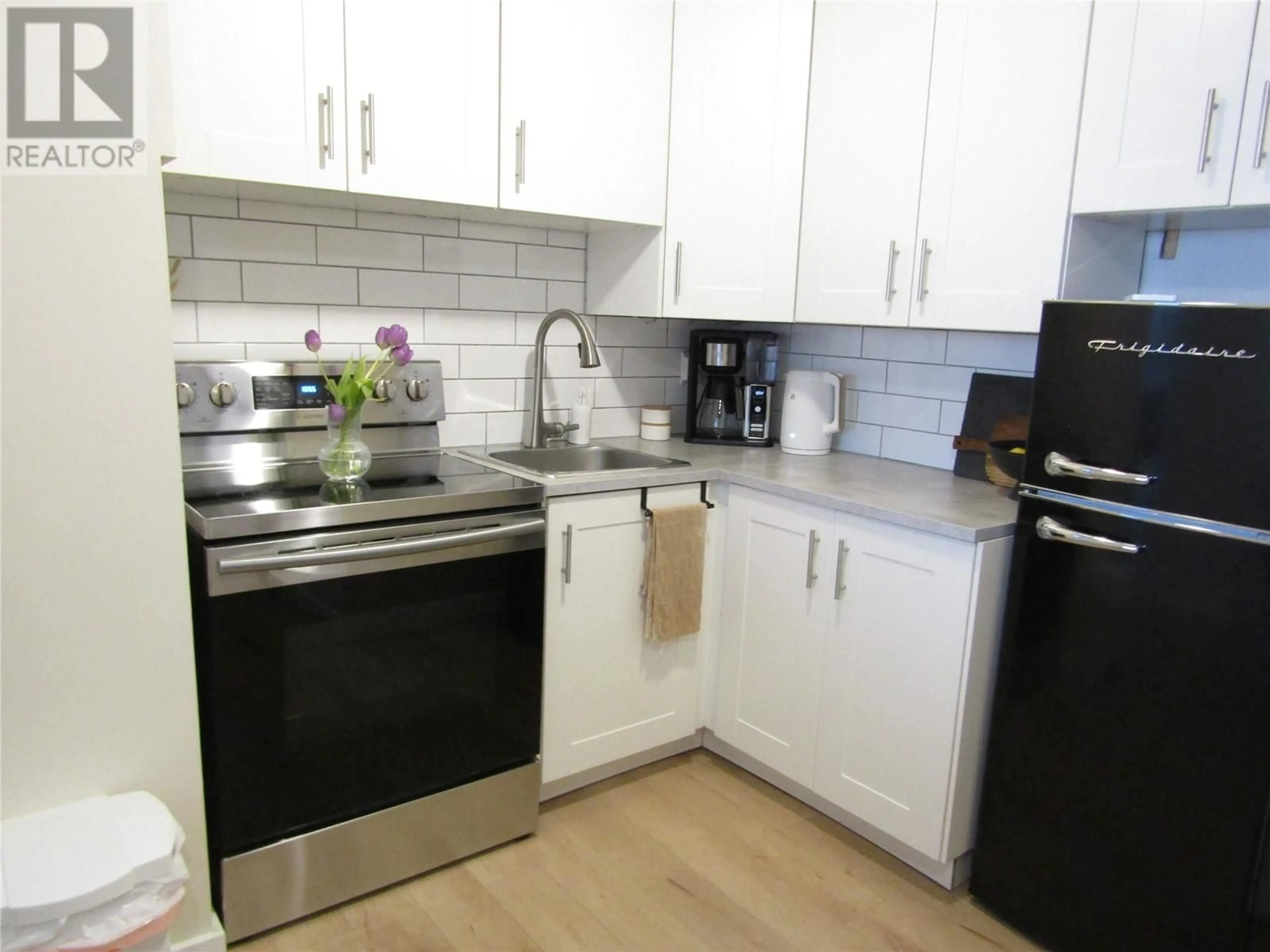 Standard kitchen, wood/laminate floor for 668 75TH Avenue Unit# 1, Grand Forks British Columbia V0H1H0