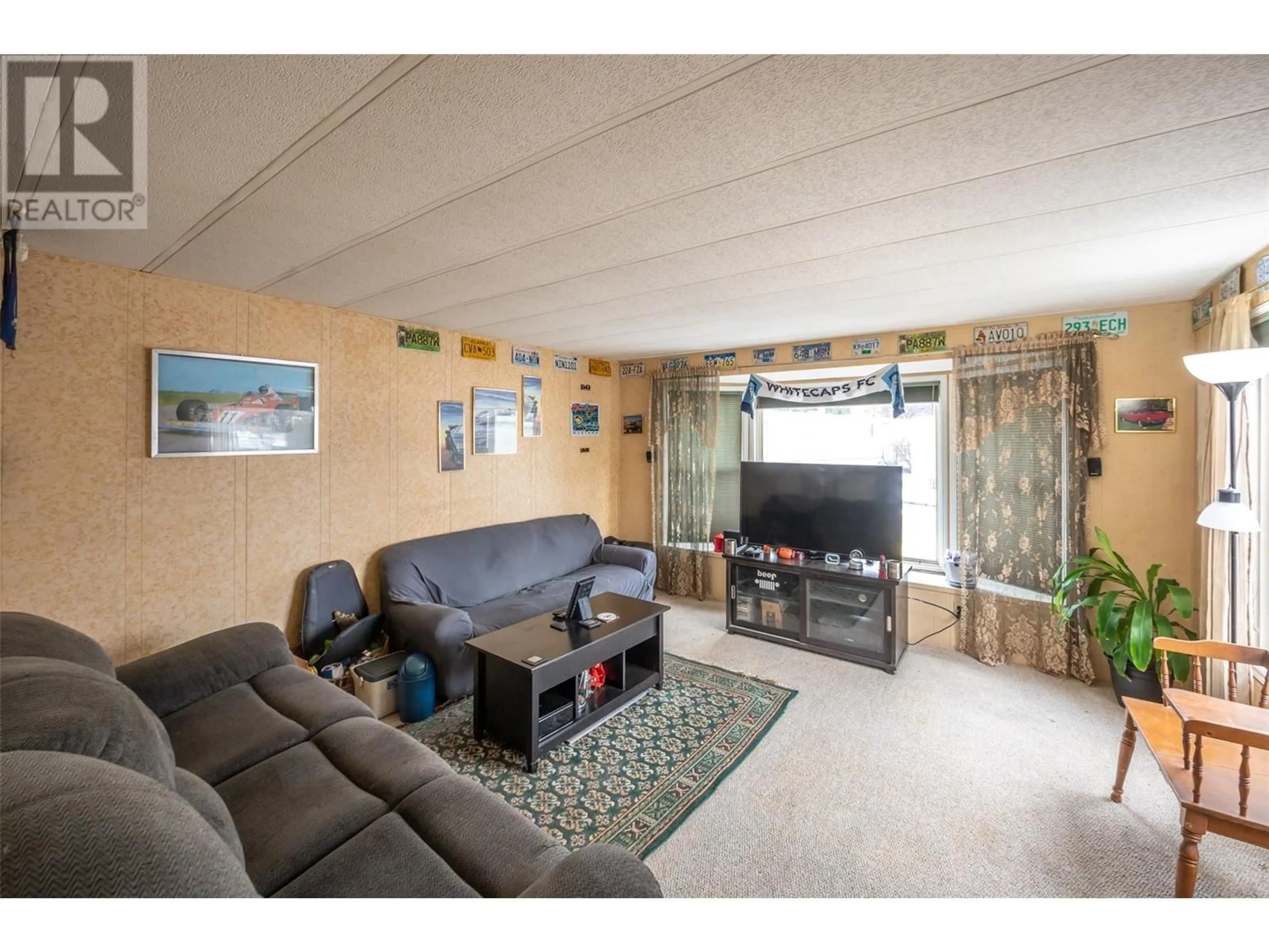 Living room with furniture, unknown for 98 Okanagan Avenue E Unit# 112, Penticton British Columbia V2A3J5