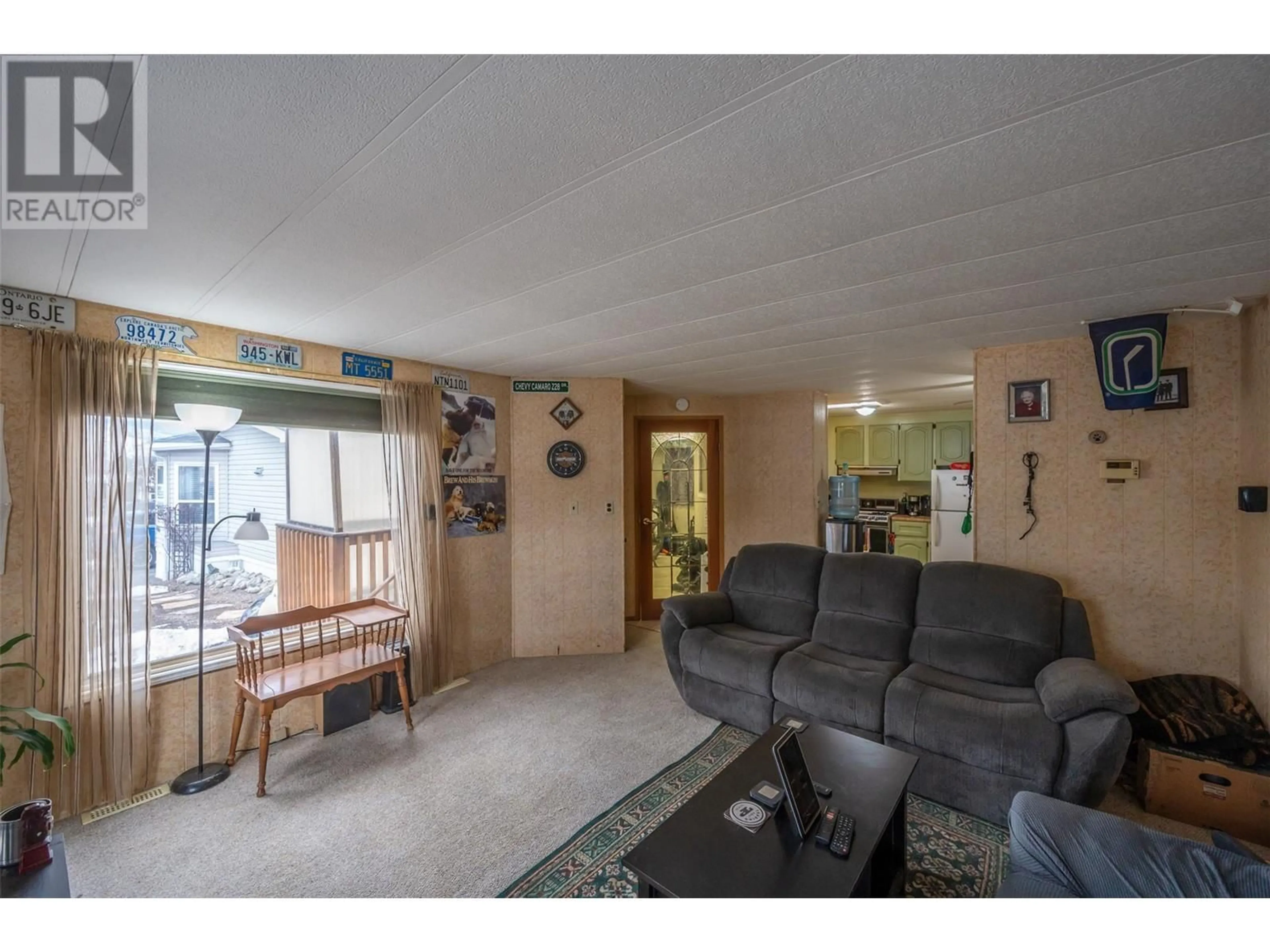 Living room with furniture, unknown for 98 Okanagan Avenue E Unit# 112, Penticton British Columbia V2A3J5