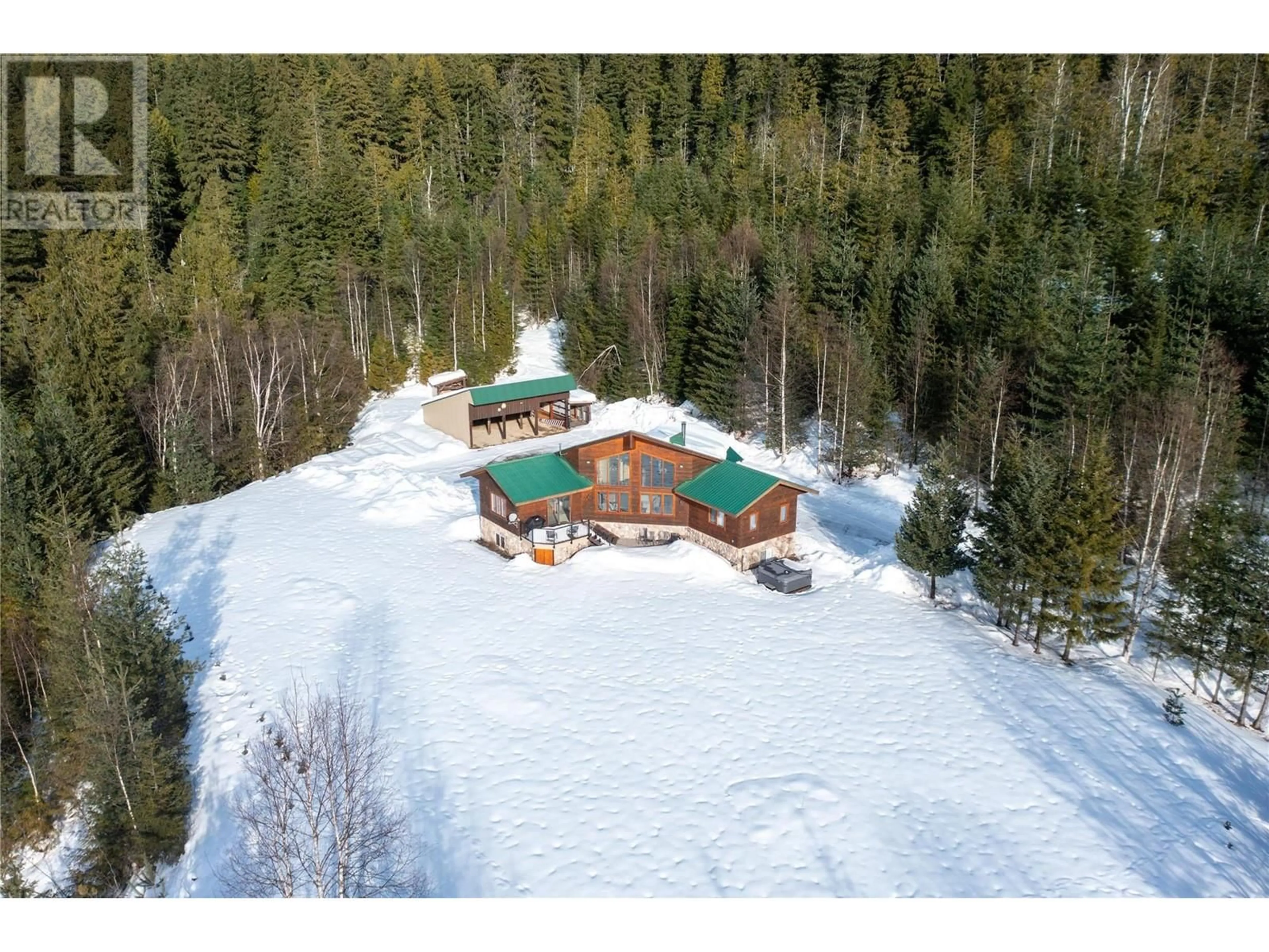 A pic from outside/outdoor area/front of a property/back of a property/a pic from drone, unknown for 600 Highway 23 North, Revelstoke British Columbia V0E2S0