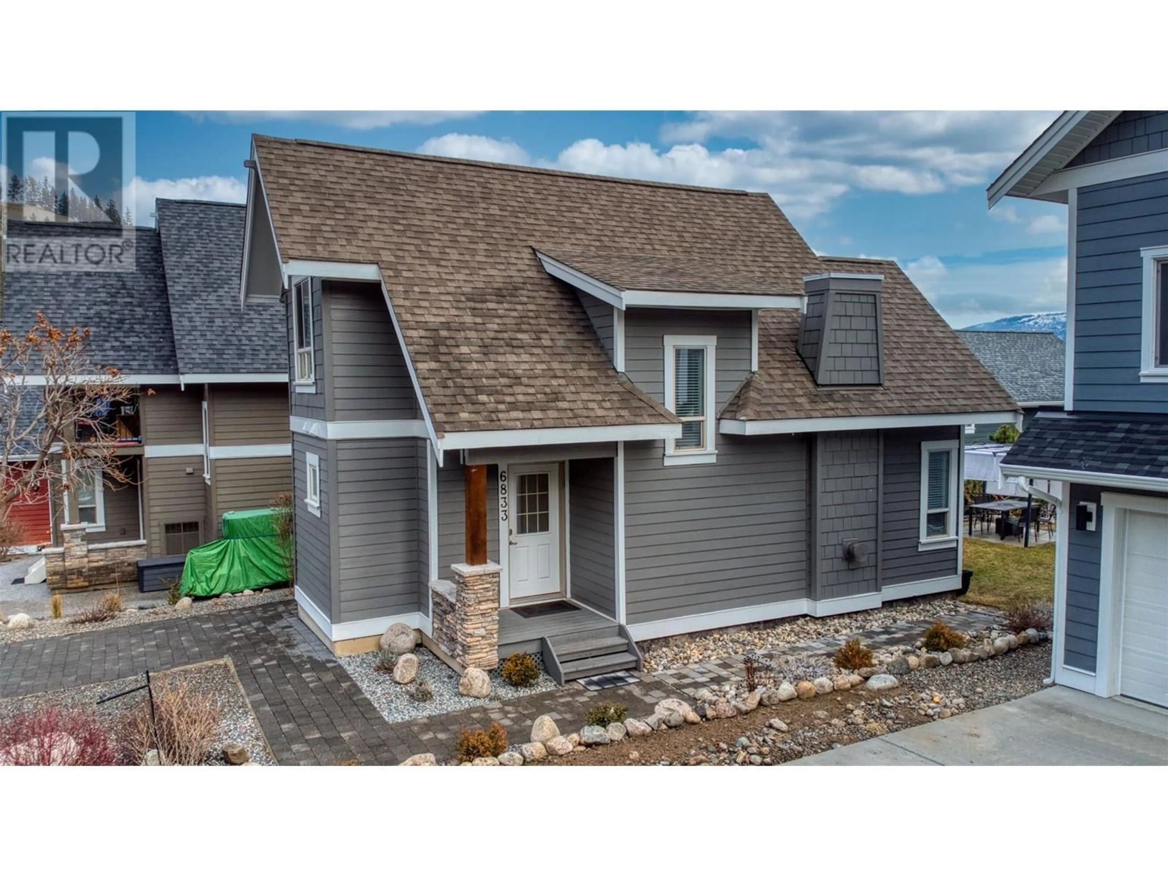 Home with vinyl exterior material, street for 136 - 6833 SANTIAGO LOOP, Kelowna British Columbia V1Z3R8