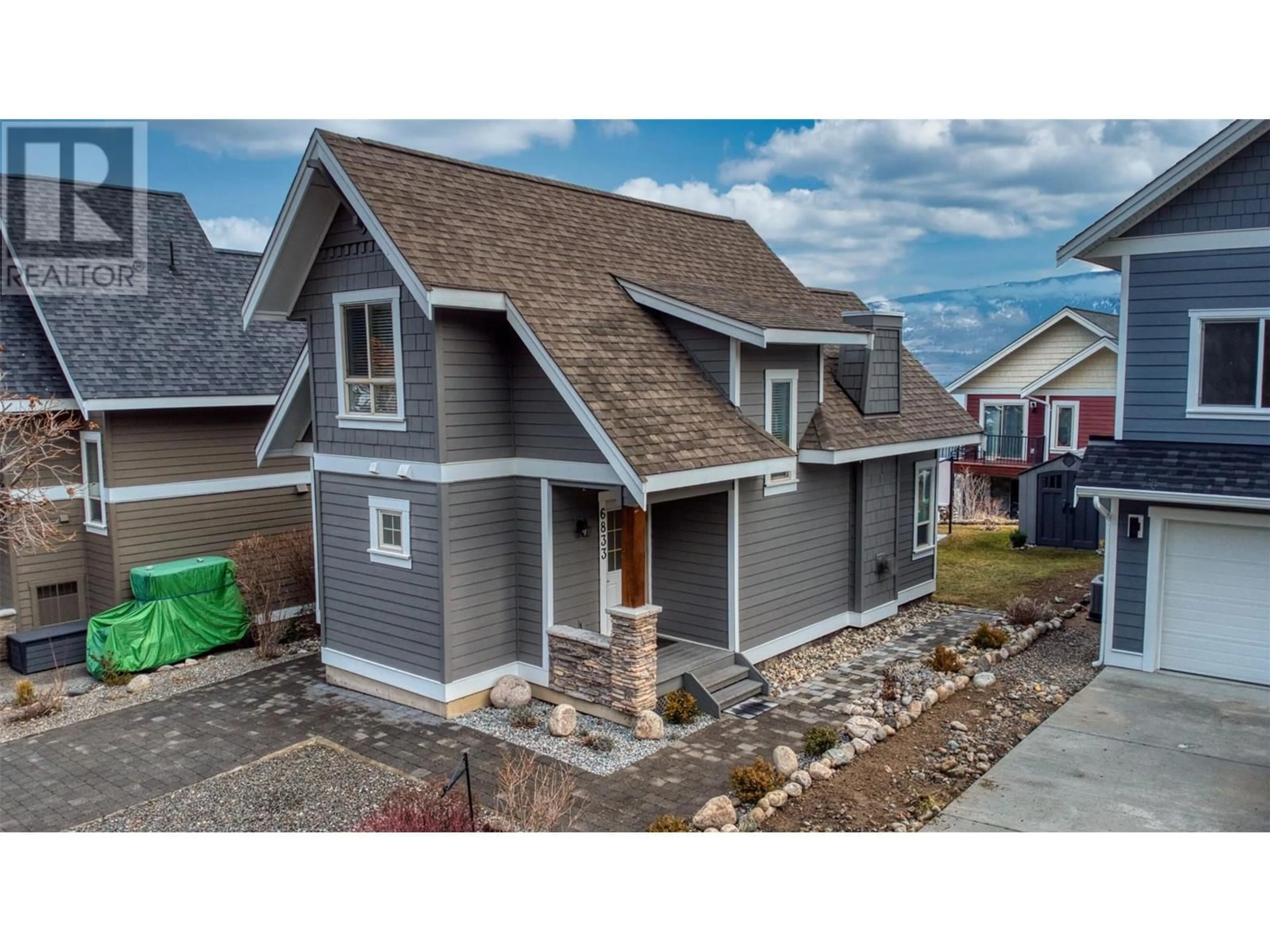 Home with vinyl exterior material, street for 136 - 6833 SANTIAGO LOOP, Kelowna British Columbia V1Z3R8