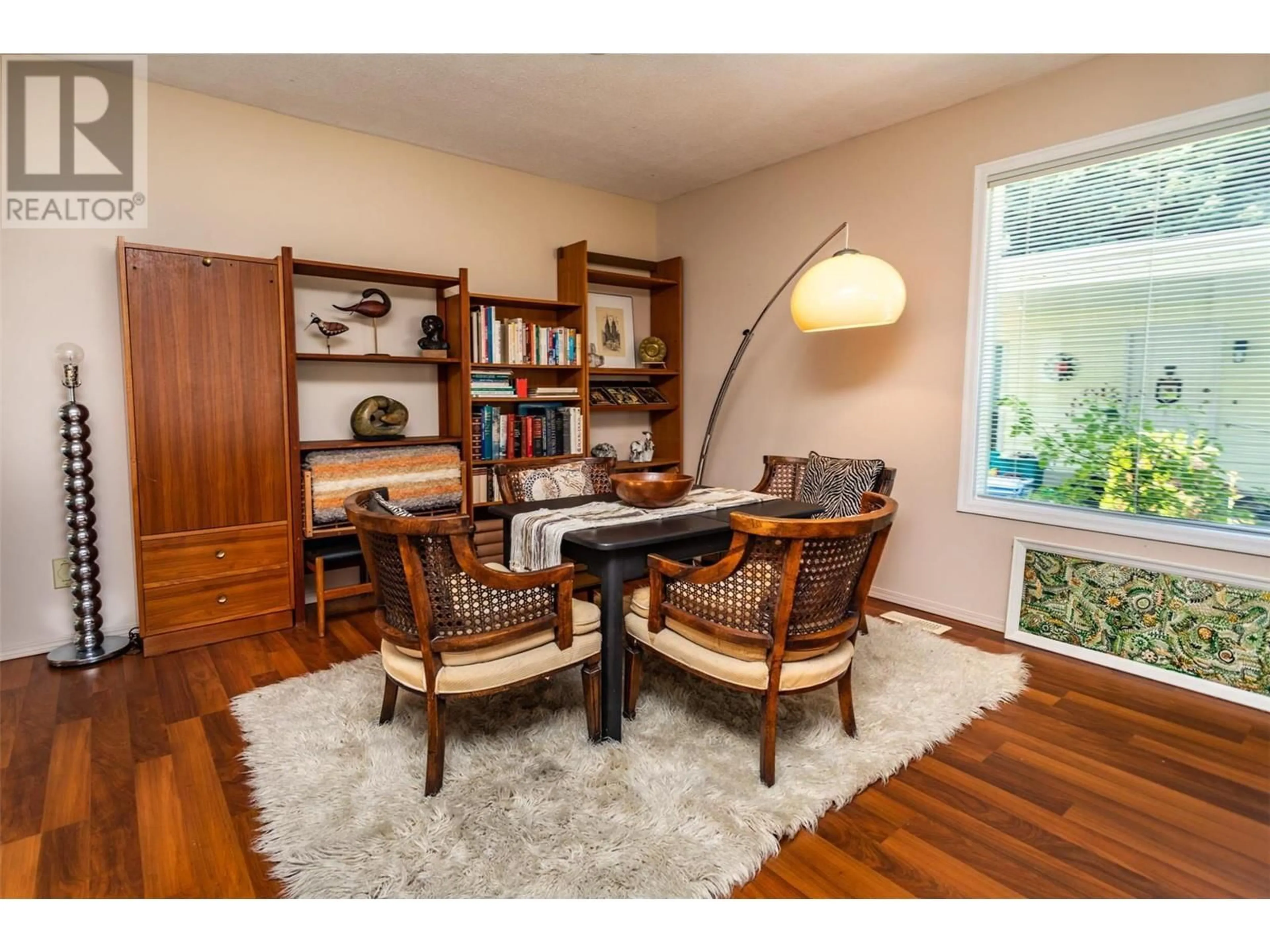 Living room with furniture, wood/laminate floor for 1255 Raymer Avenue Unit# 184, Kelowna British Columbia V1W3S3