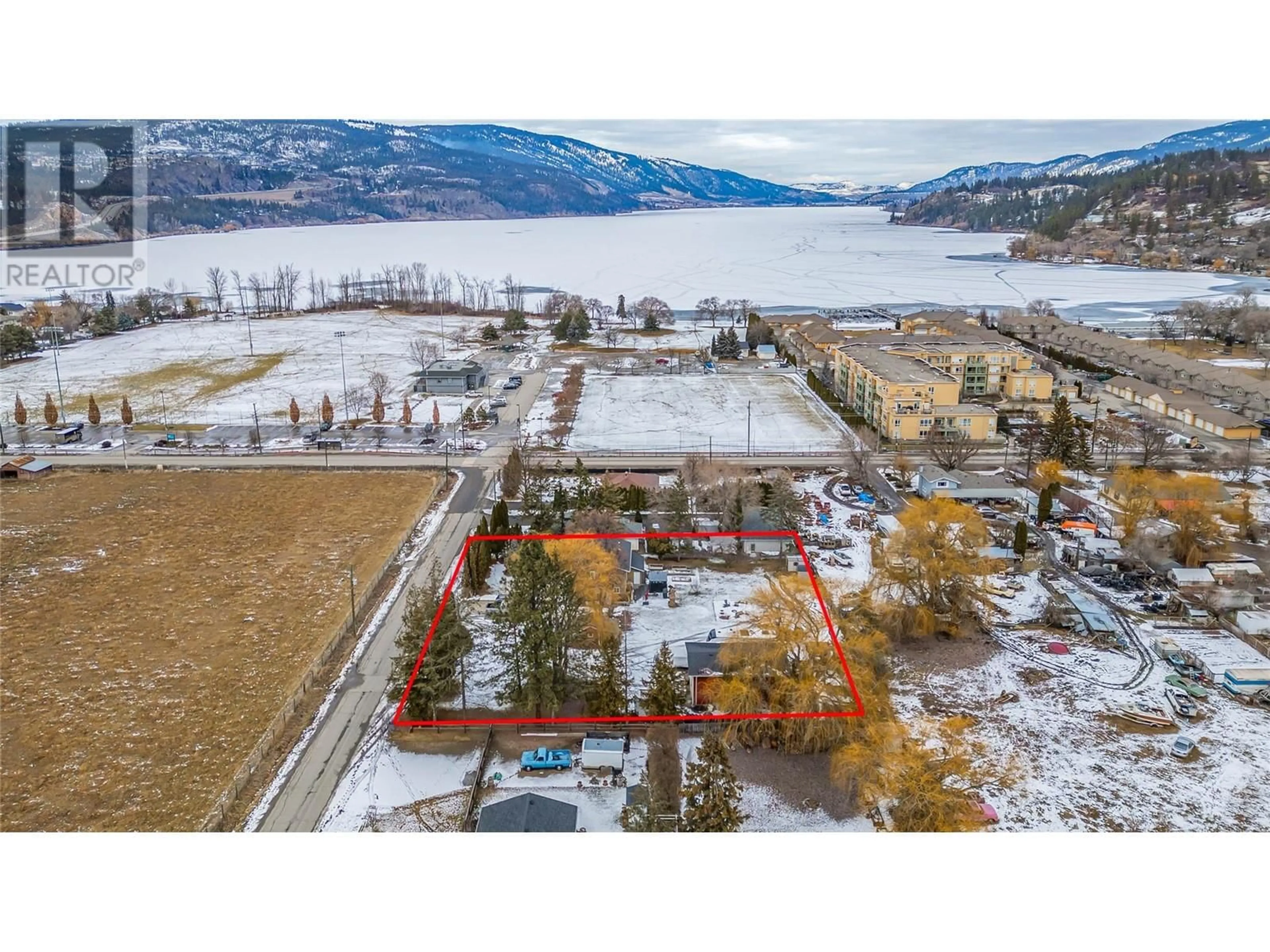 A pic from outside/outdoor area/front of a property/back of a property/a pic from drone, water/lake/river/ocean view for 11441 Reiswig Road, Lake Country British Columbia V4V1Y5