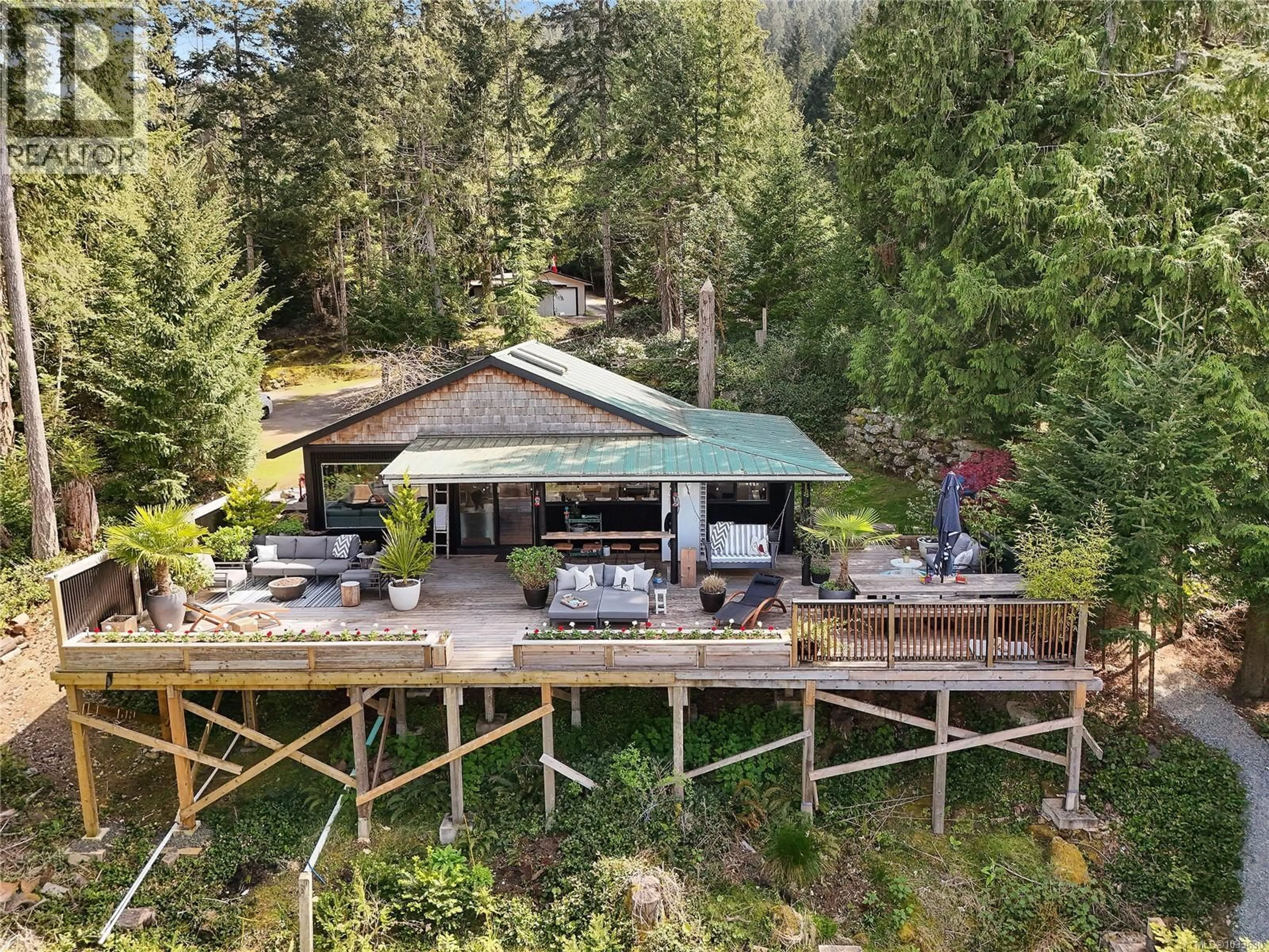 A pic from outside/outdoor area/front of a property/back of a property/a pic from drone, water/lake/river/ocean view for 430 MCKERCHER ROAD, Mayne Island British Columbia V0N2J2