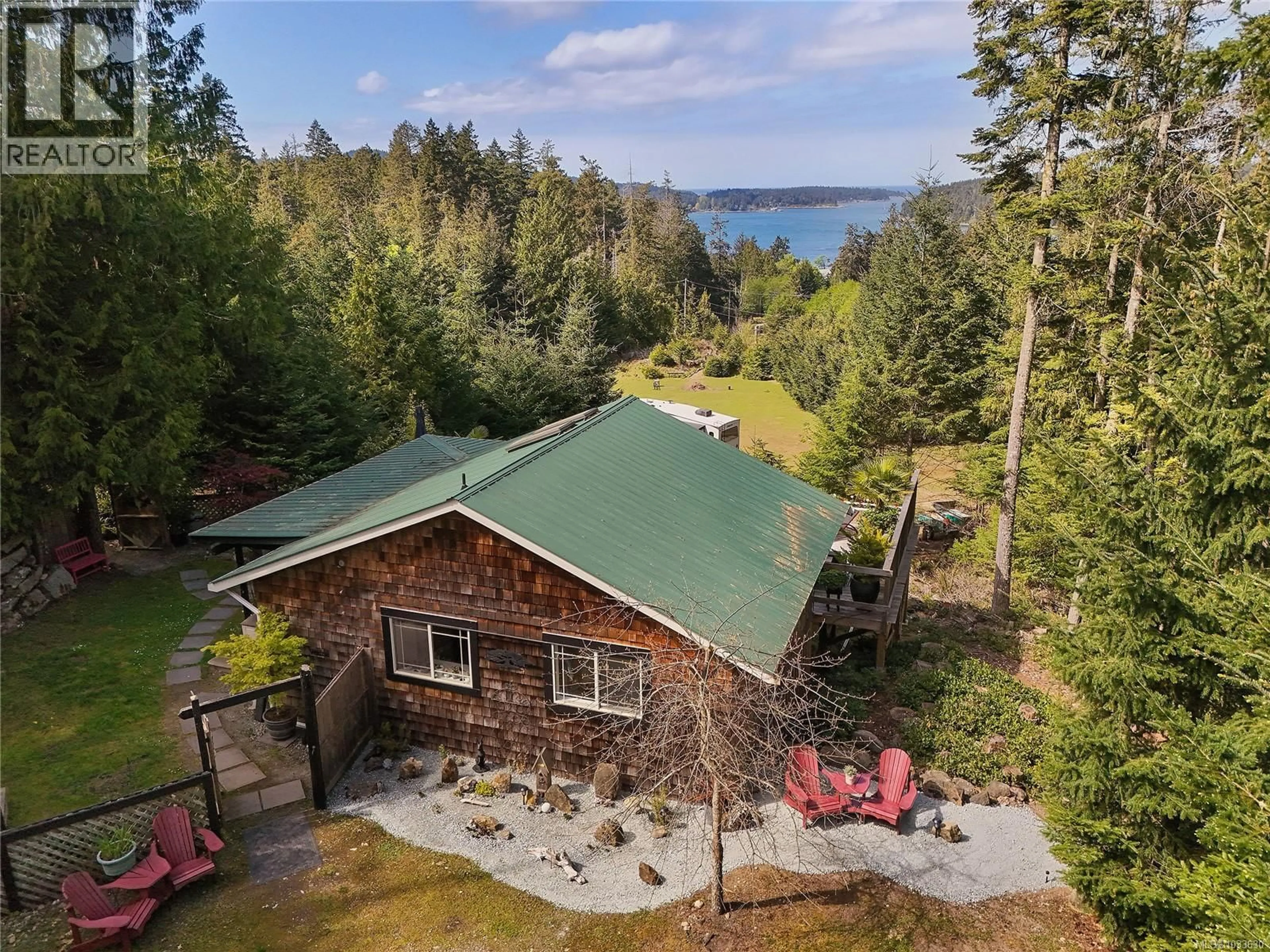 A pic from outside/outdoor area/front of a property/back of a property/a pic from drone, water/lake/river/ocean view for 430 MCKERCHER ROAD, Mayne Island British Columbia V0N2J2