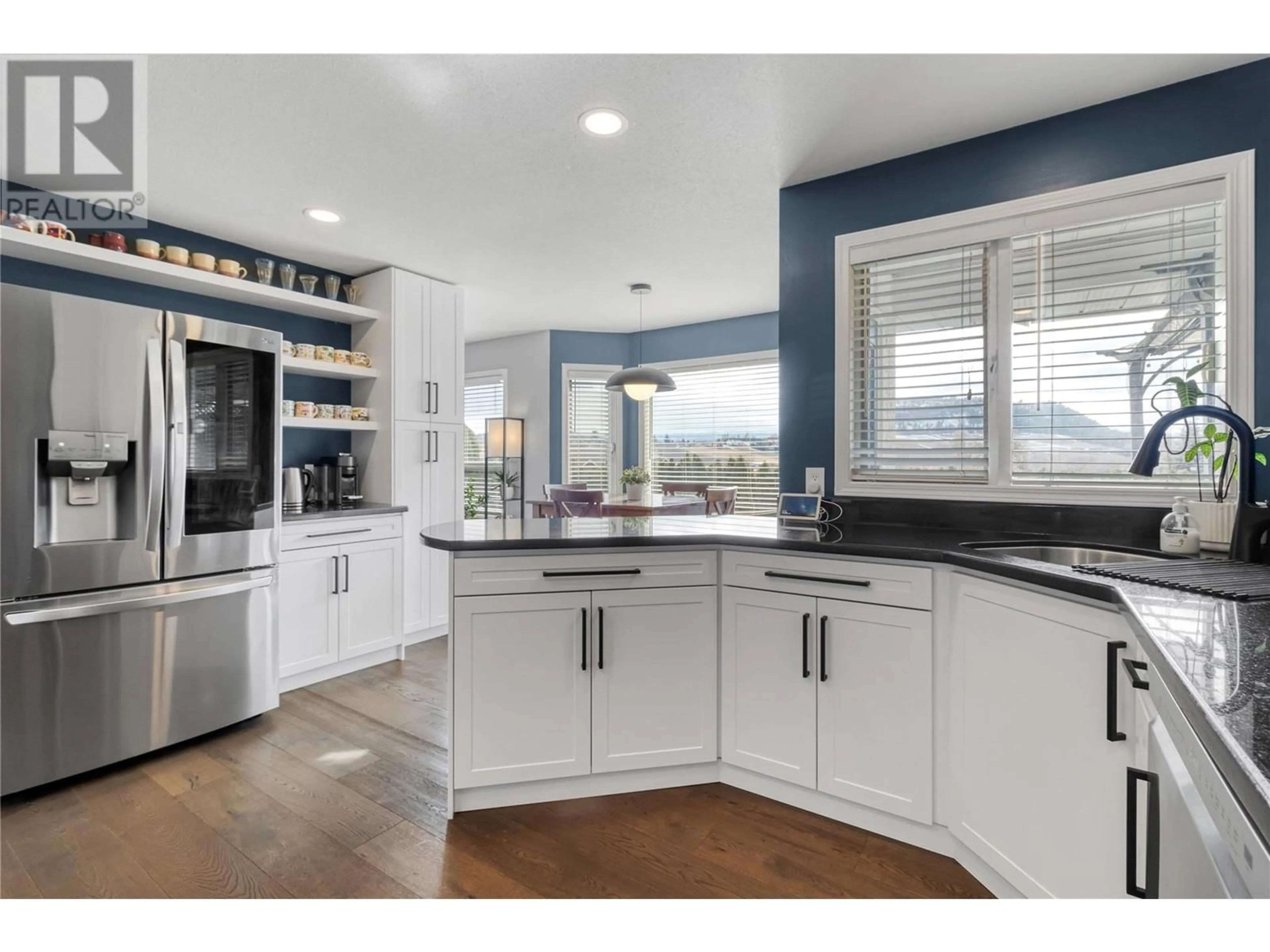 Contemporary kitchen, ceramic/tile floor for 102 Summerhill Place, Kelowna British Columbia V1V1T7