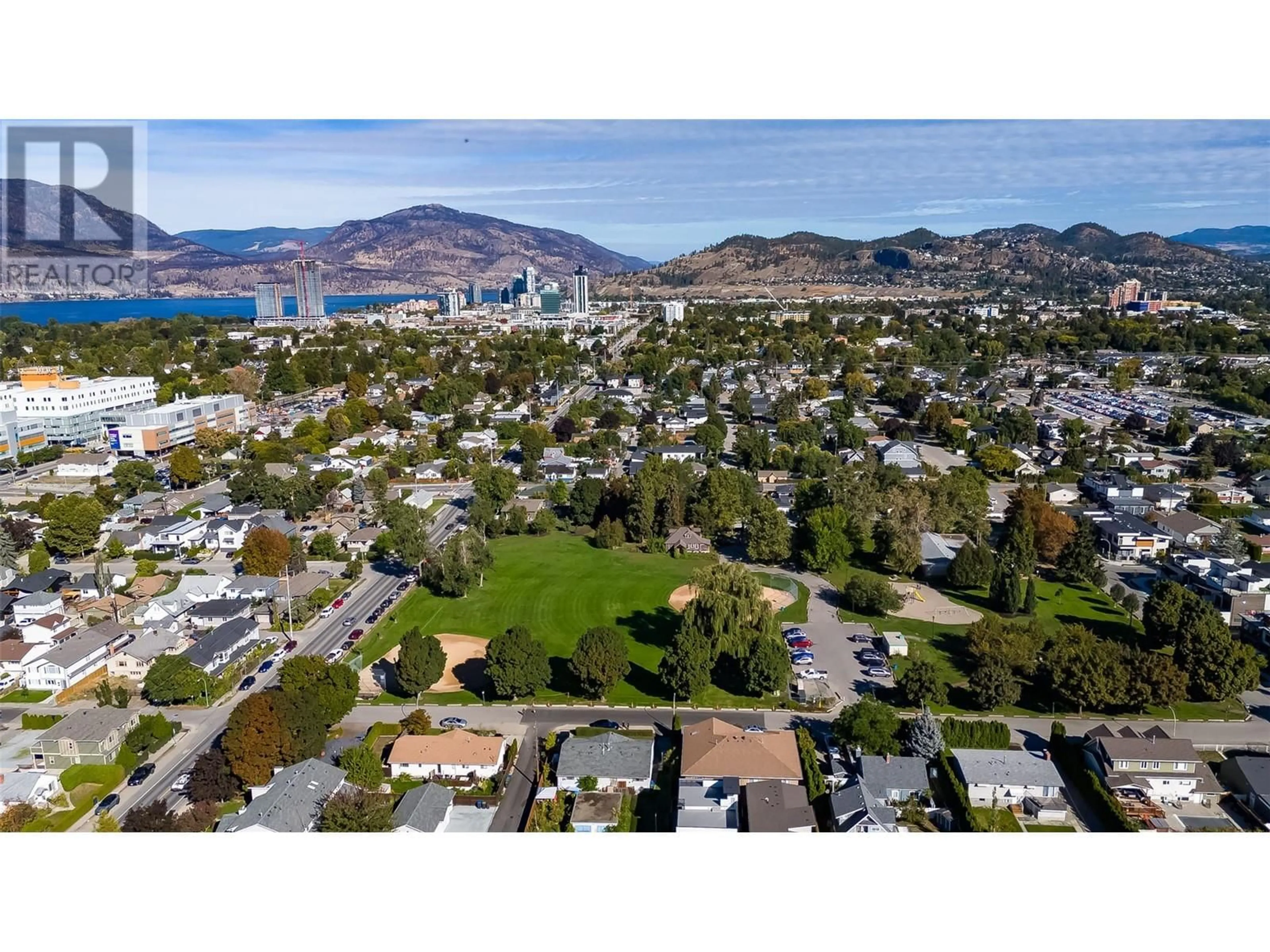 A pic from outside/outdoor area/front of a property/back of a property/a pic from drone, mountain view for 755 Birch Avenue, Kelowna British Columbia V1Y5H3