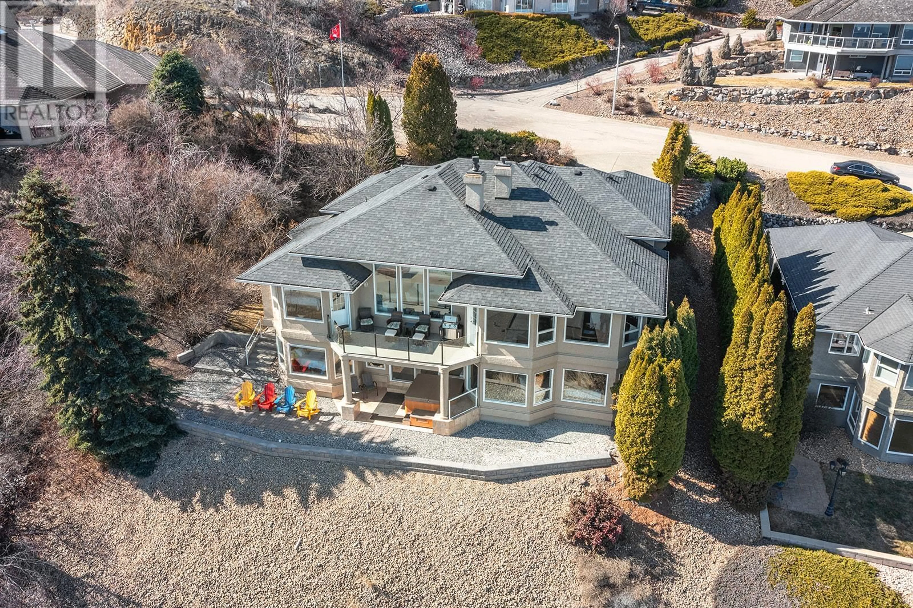 A pic from outside/outdoor area/front of a property/back of a property/a pic from drone, water/lake/river/ocean view for 7905 STONERIDGE Drive, Coldstream British Columbia V1B2T7