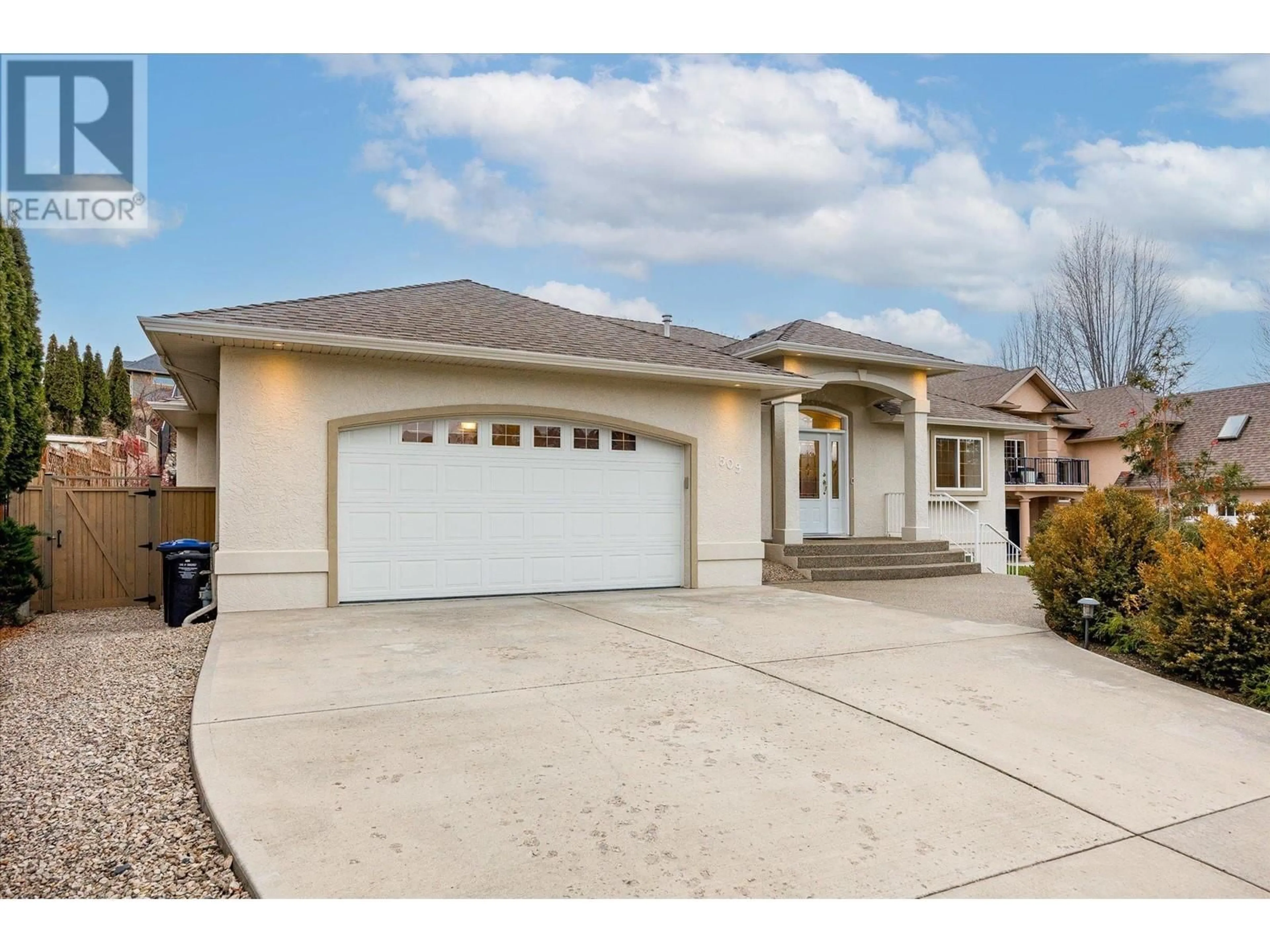 Home with vinyl exterior material, street for 509 CURLEW DRIVE, Kelowna British Columbia V1W4K9