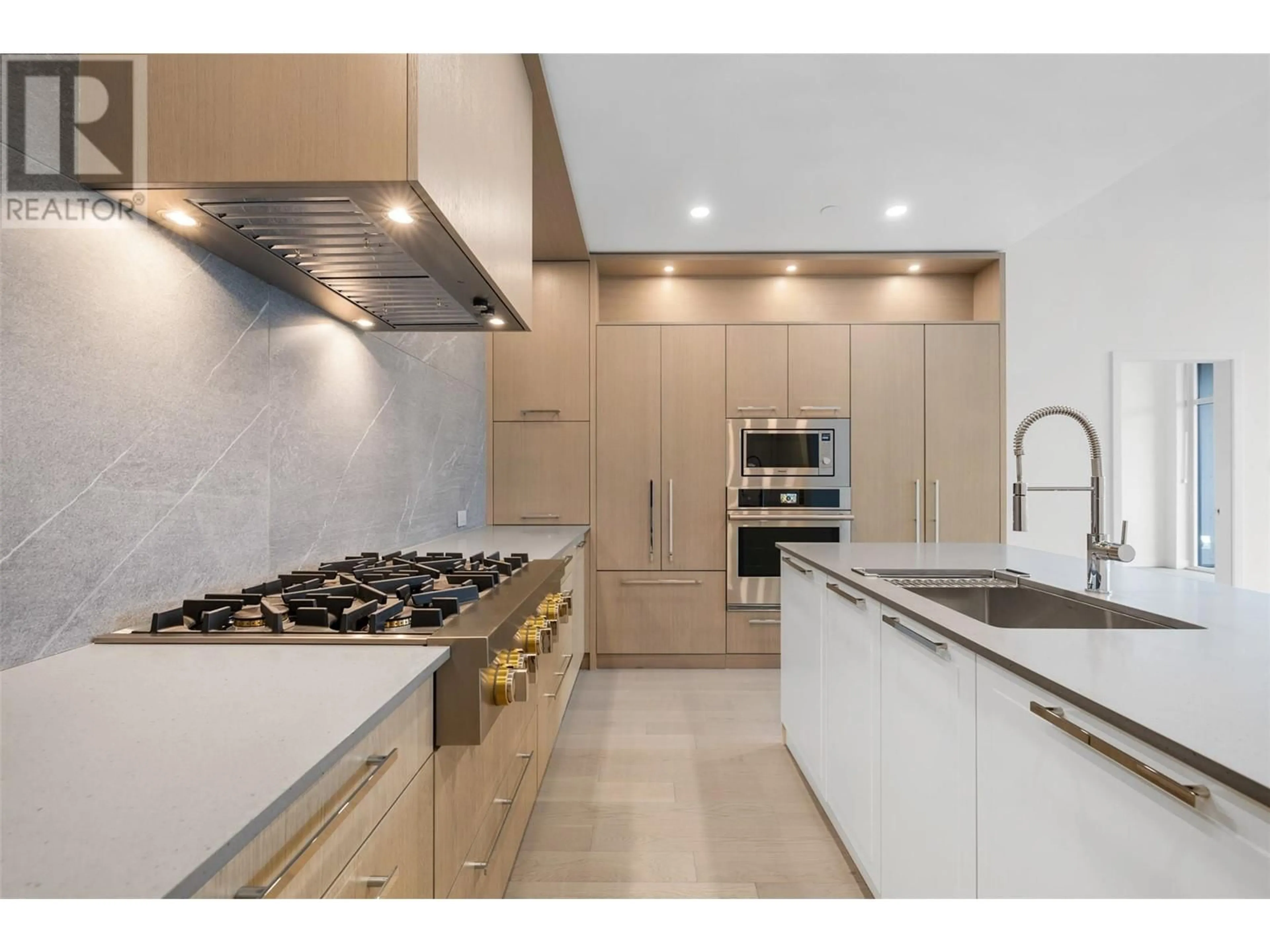Contemporary kitchen, ceramic/tile floor for 403 - 3389 LAKESHORE ROAD, Kelowna British Columbia V1W0G5