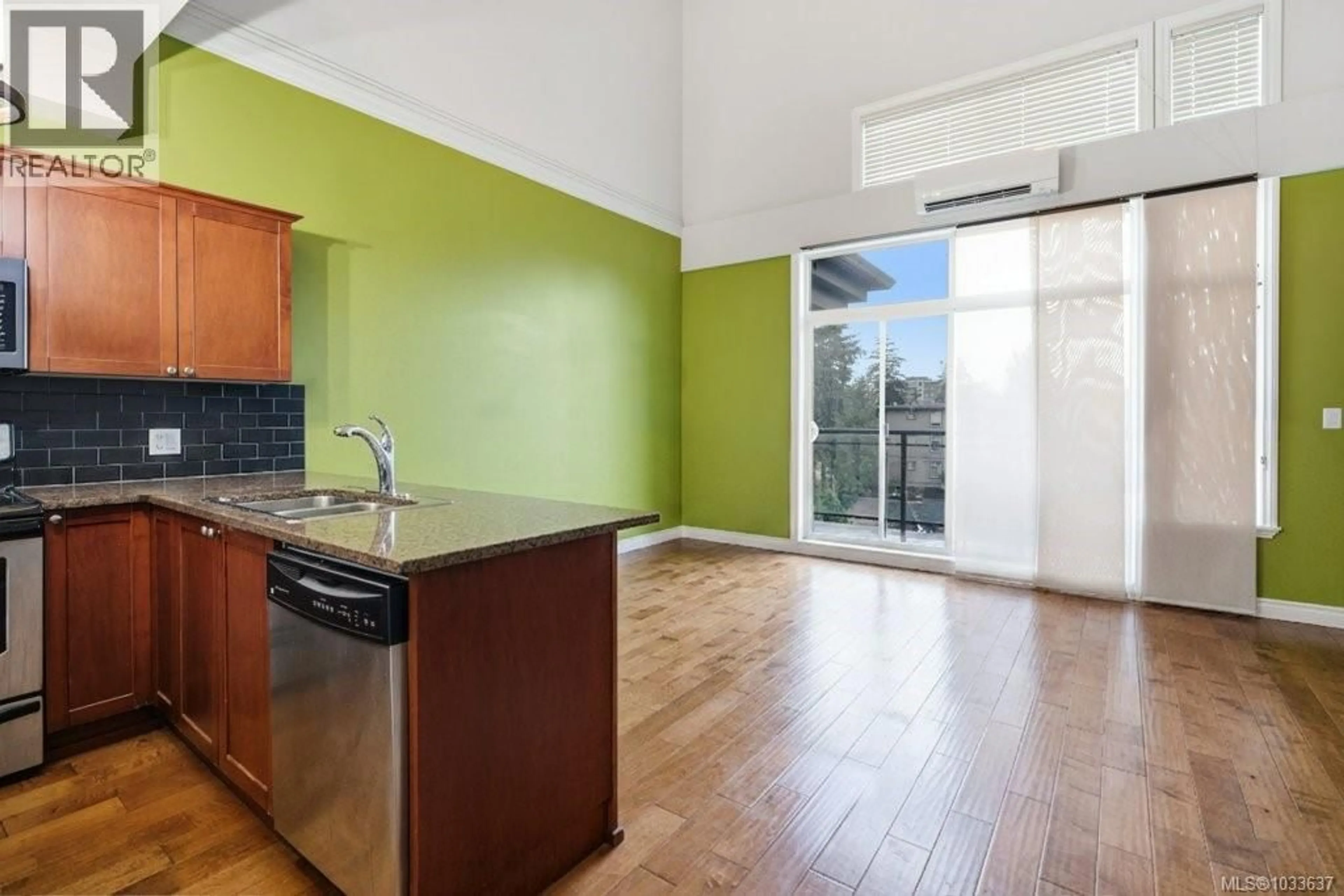 Open concept kitchen, wood/laminate floor for 407 - 866 GOLDSTREAM AVENUE, Langford British Columbia V9B2X9