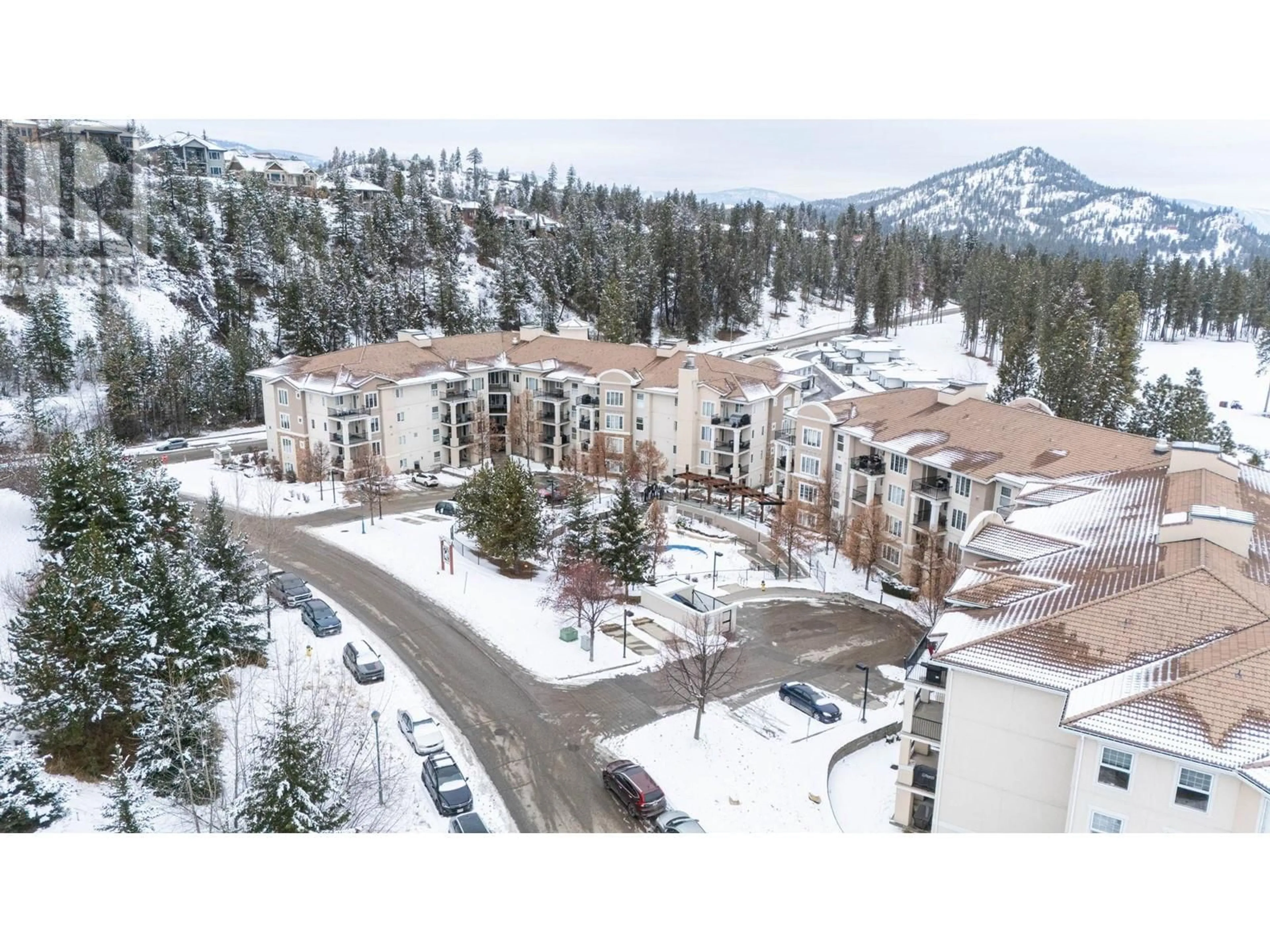 A pic from outside/outdoor area/front of a property/back of a property/a pic from drone, mountain view for 3168 Via Centrale Road Unit# 1202, Kelowna British Columbia V1V2R6