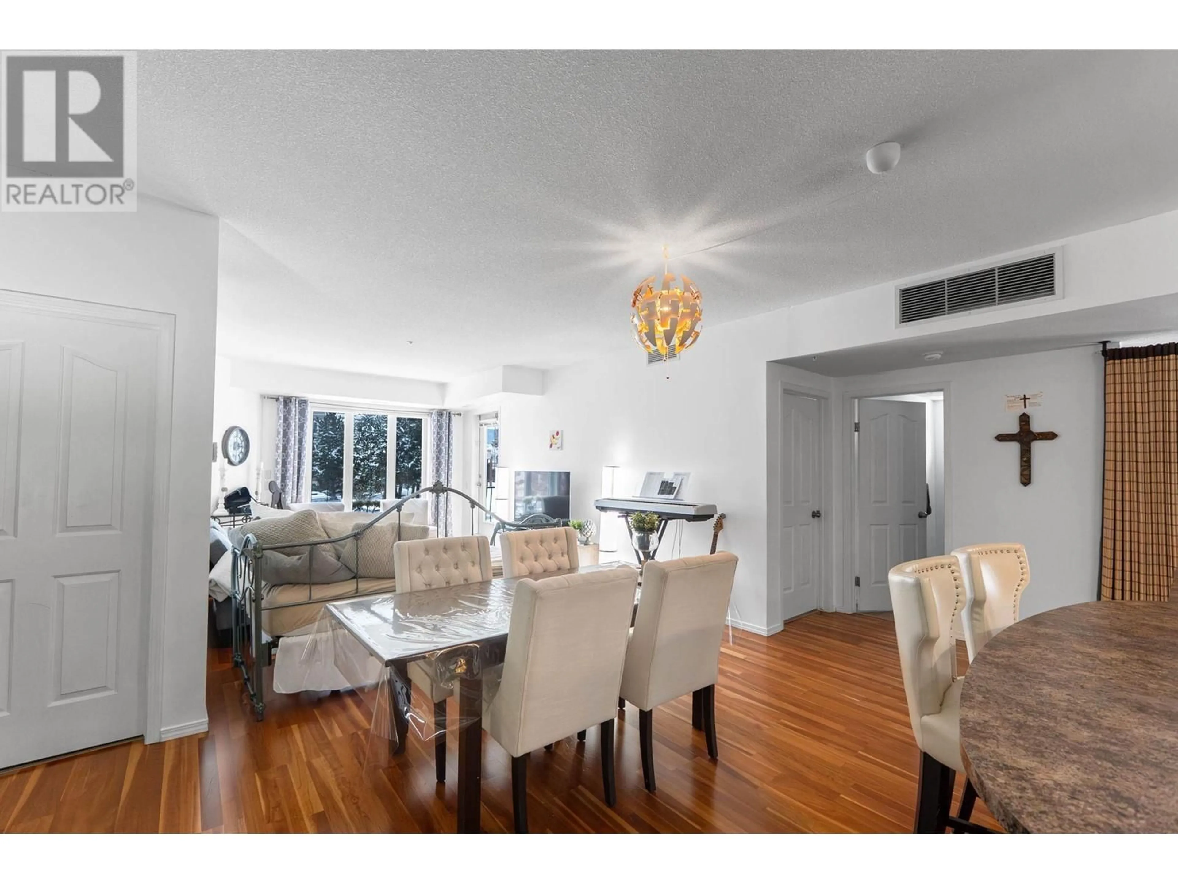 Dining room, wood/laminate floor for 3168 Via Centrale Road Unit# 1202, Kelowna British Columbia V1V2R6