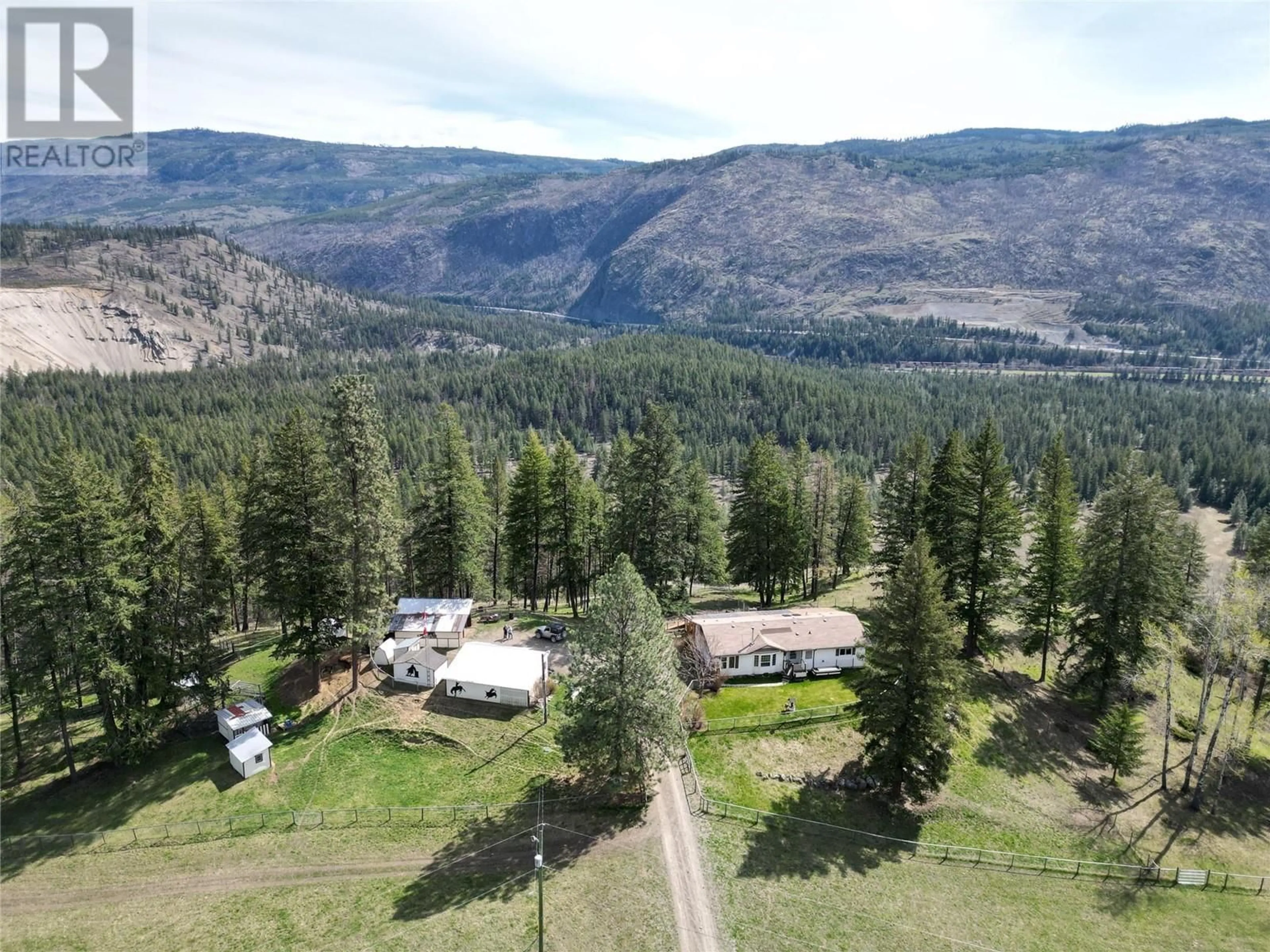 A pic from outside/outdoor area/front of a property/back of a property/a pic from drone, mountain view for 2300 WESTSYDE ROAD NORTH, Barriere British Columbia V0E1E0