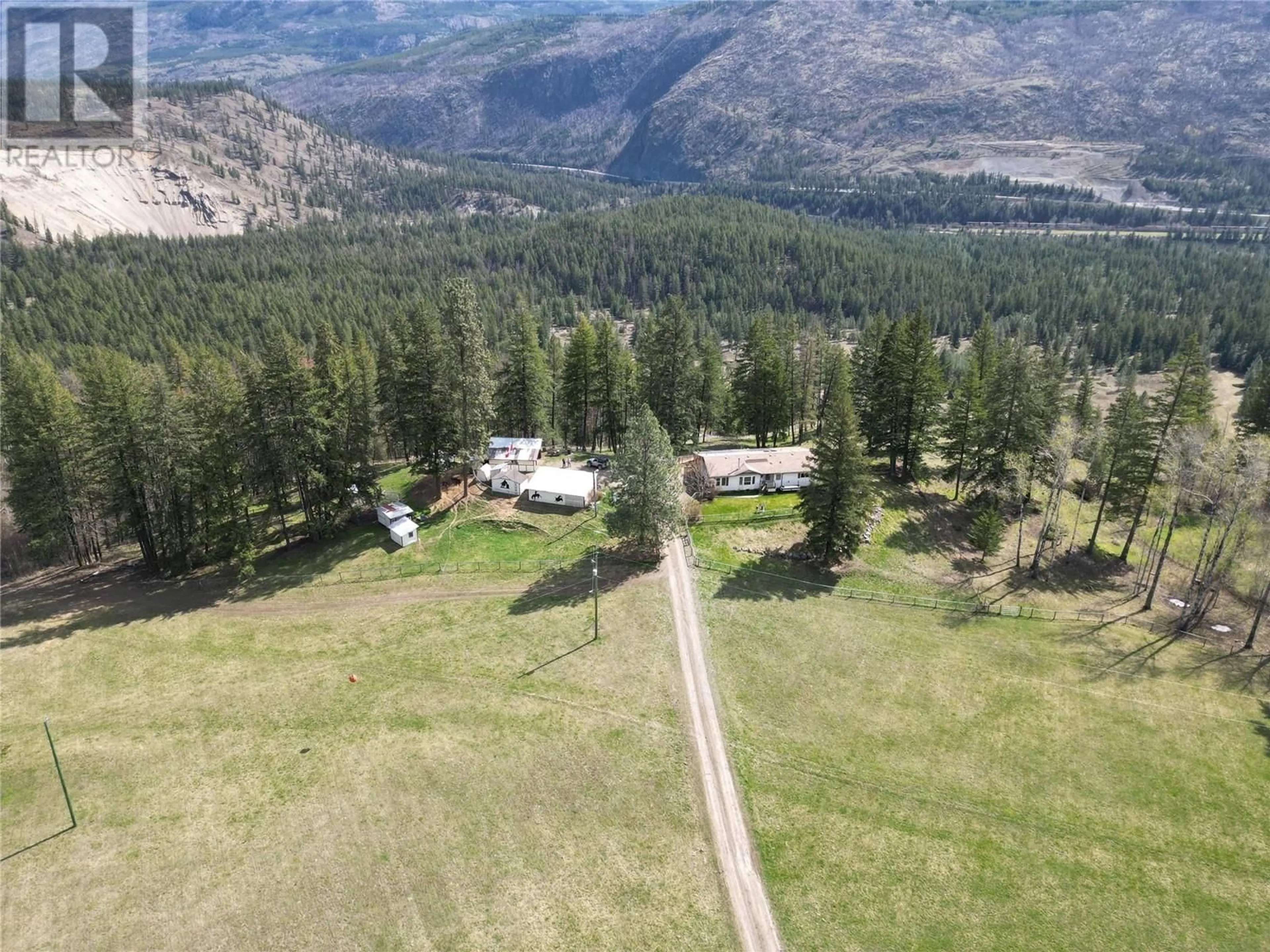 A pic from outside/outdoor area/front of a property/back of a property/a pic from drone, mountain view for 2300 WESTSYDE ROAD NORTH, Barriere British Columbia V0E1E0