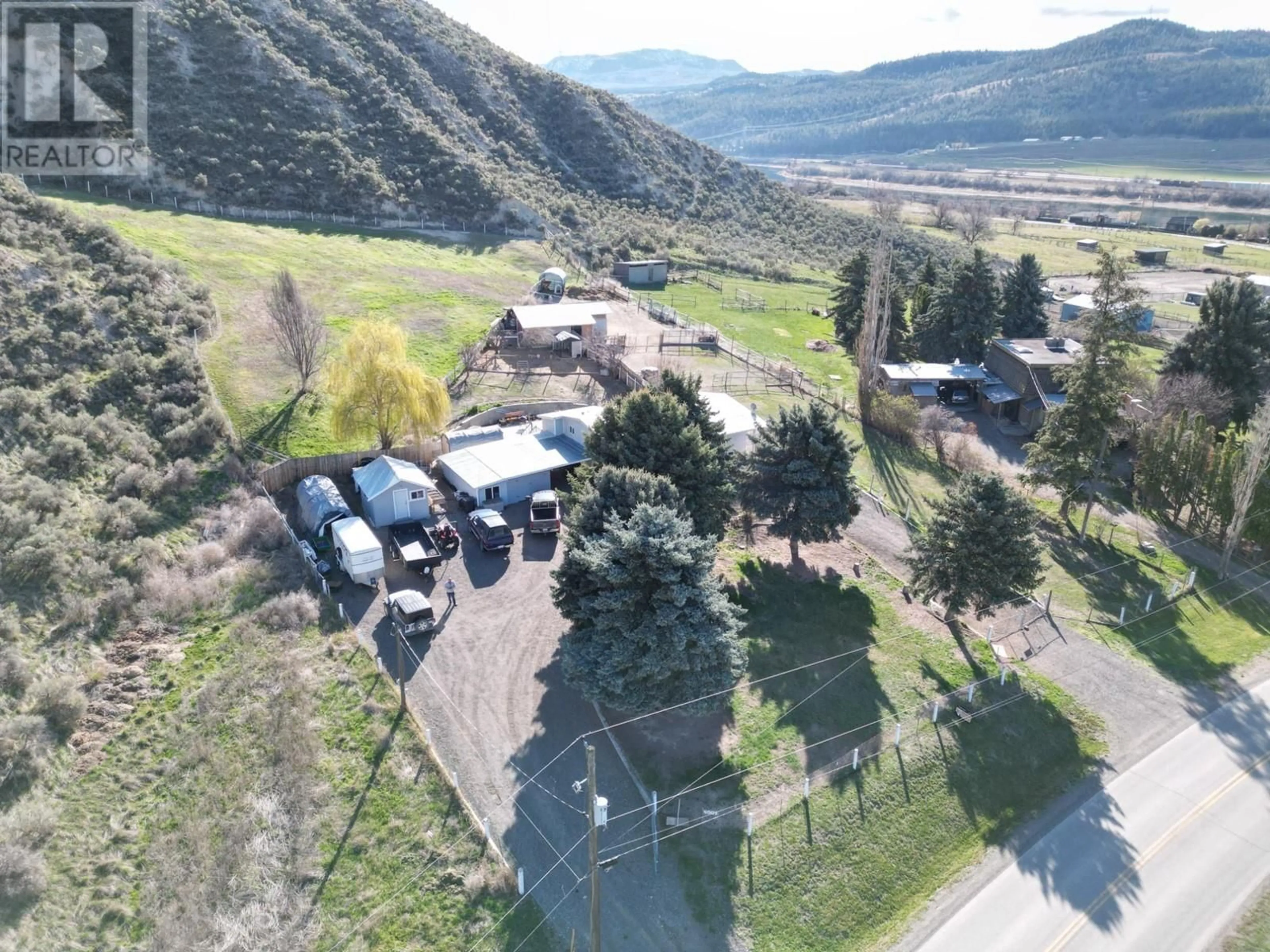 A pic from outside/outdoor area/front of a property/back of a property/a pic from drone, mountain view for 4001 SHUSWAP Road, Kamloops British Columbia V2H1S7