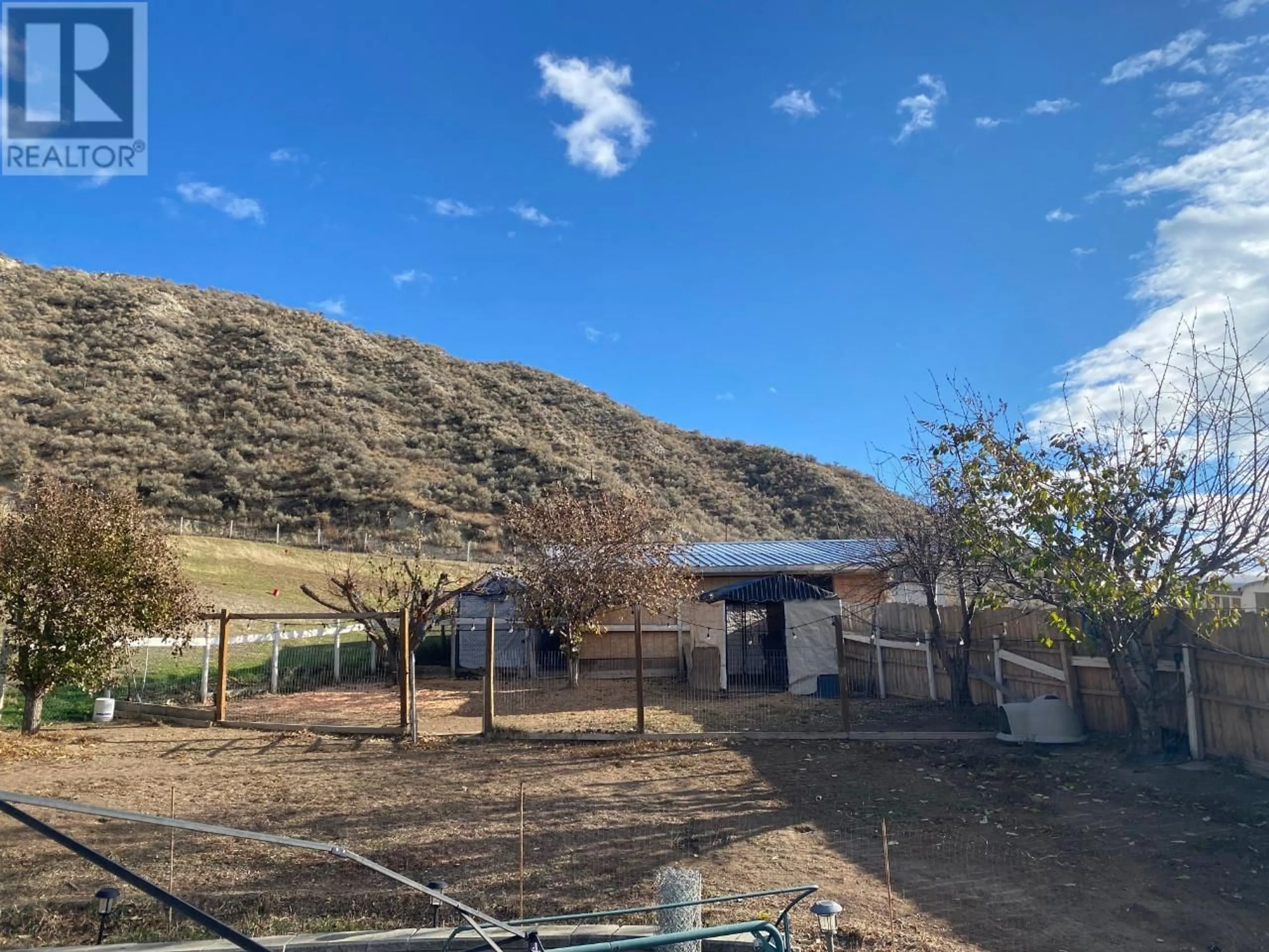 A pic from outside/outdoor area/front of a property/back of a property/a pic from drone, mountain view for 4001 SHUSWAP Road, Kamloops British Columbia V2H1S7