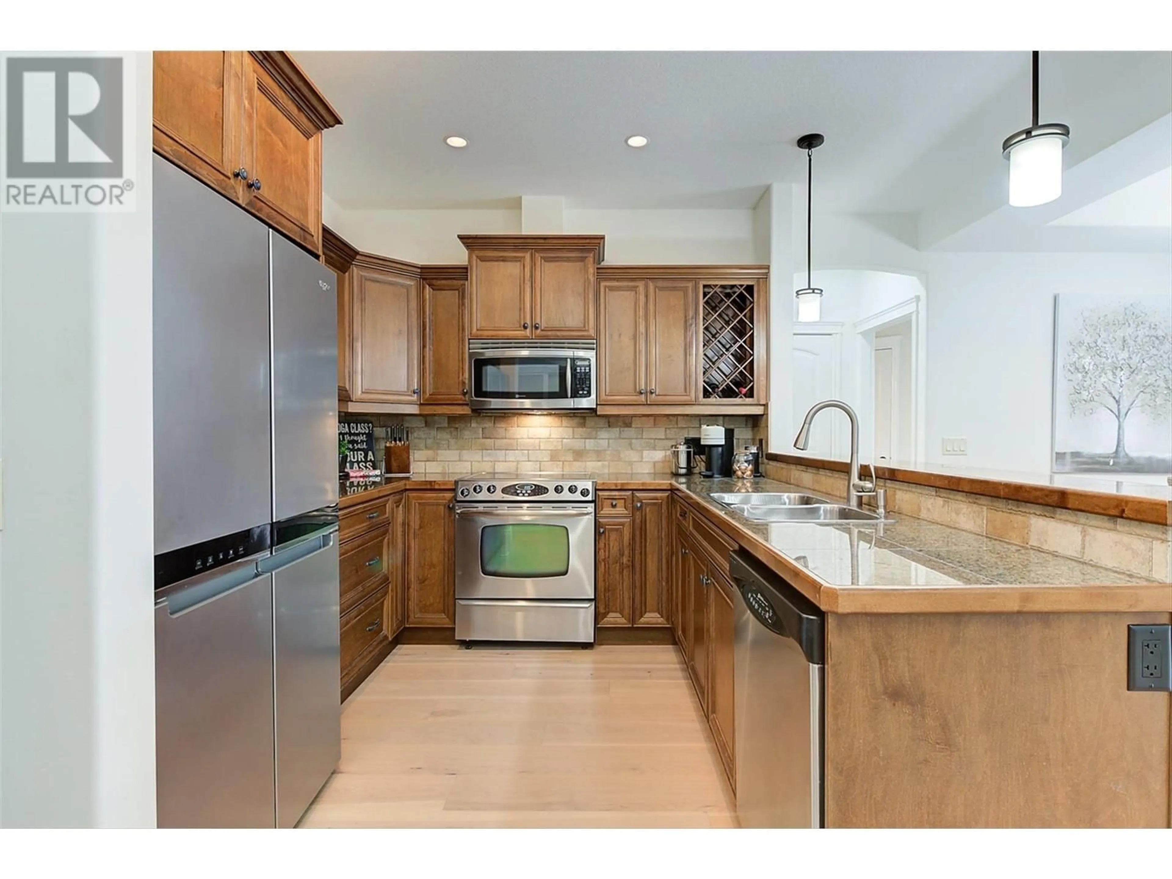 Open concept kitchen, ceramic/tile floor for 201 - 2770 AUBURN ROAD, West Kelowna British Columbia V4T4C2