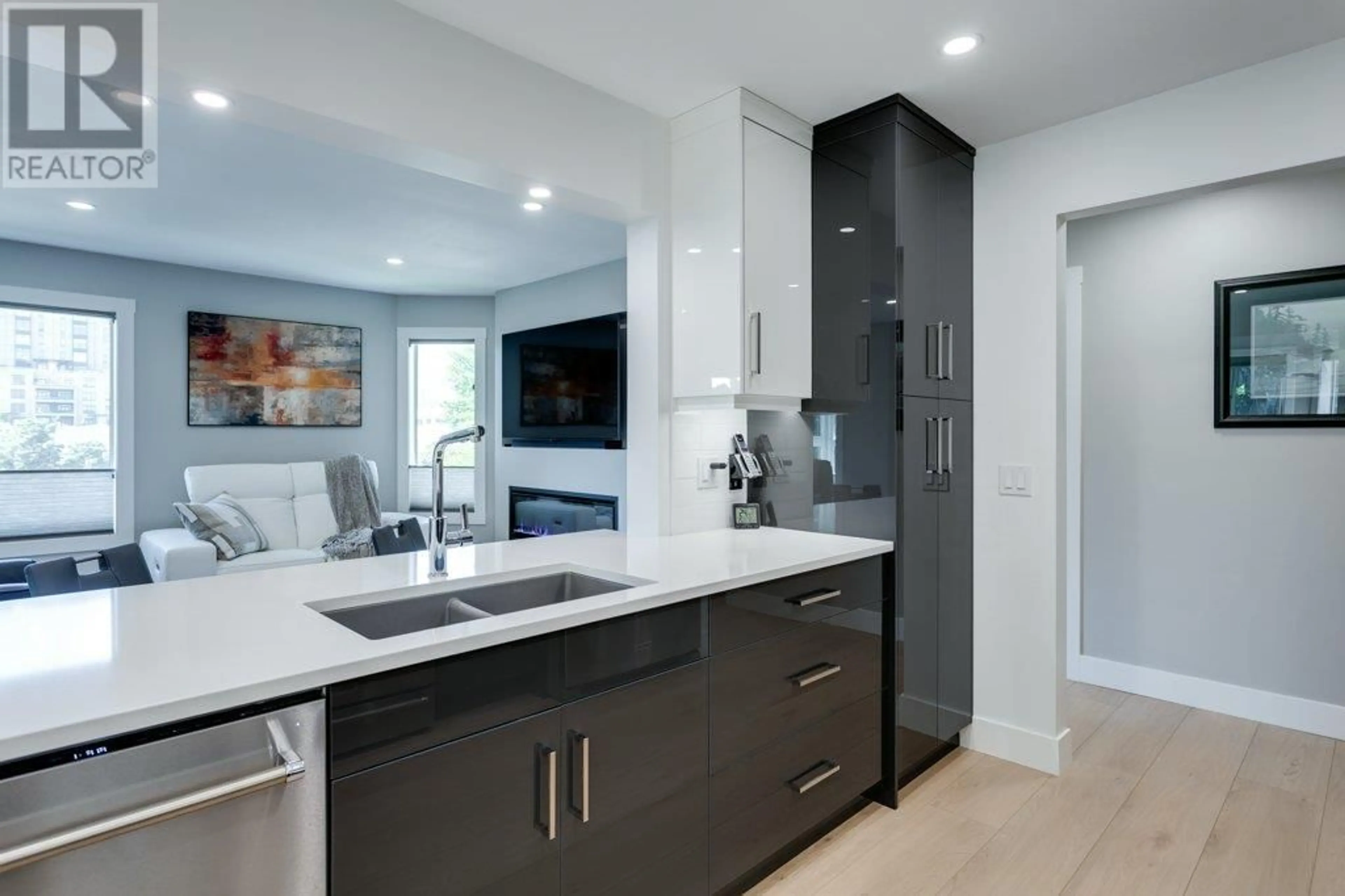 Contemporary kitchen, ceramic/tile floor for 309 - 1385 BERTRAM STREET, Kelowna British Columbia V1Y2E9