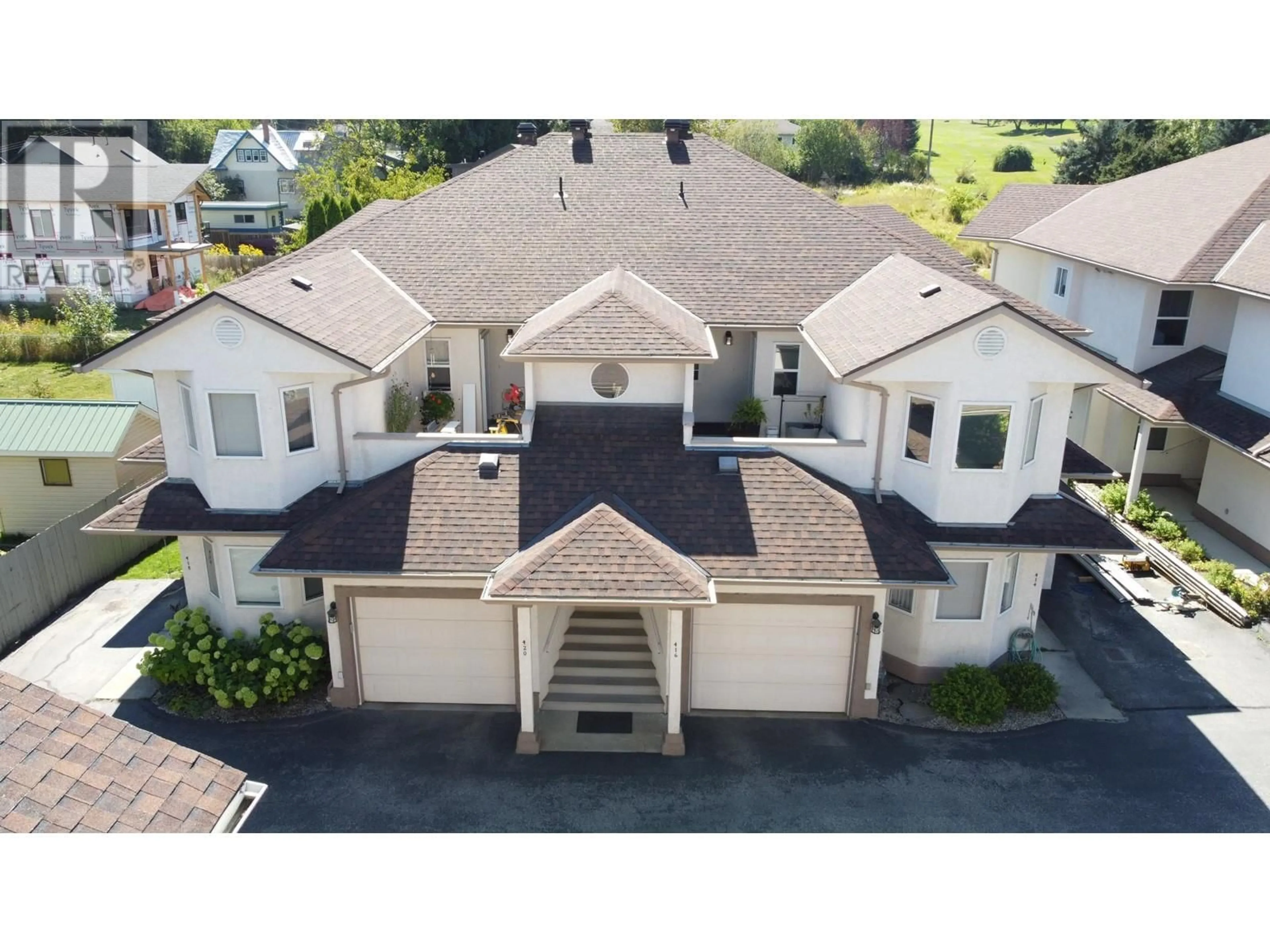 A pic from outside/outdoor area/front of a property/back of a property/a pic from drone, unknown for 416 BEASLEY  W Crescent, Nelson British Columbia V1L5Y4