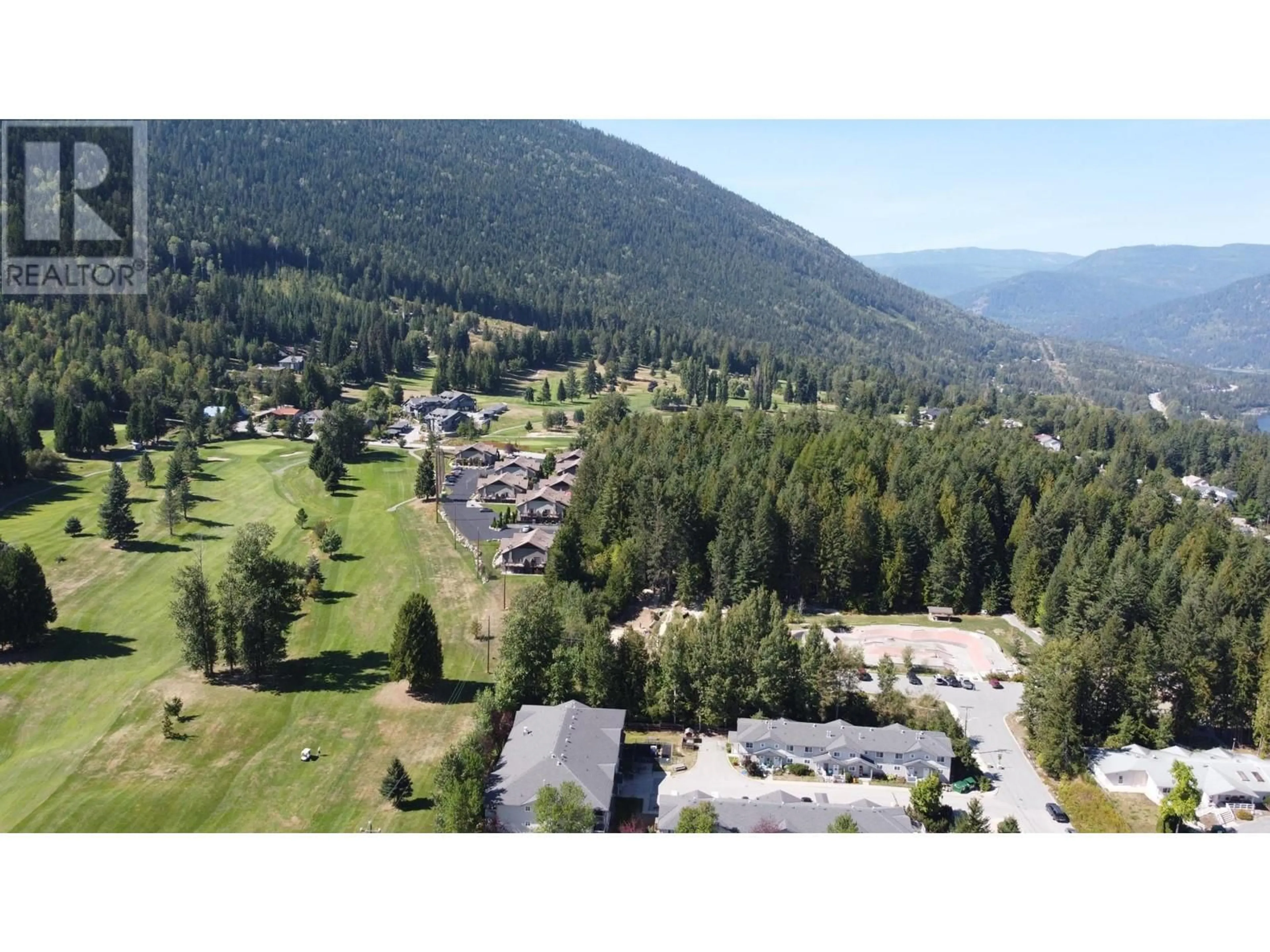 A pic from outside/outdoor area/front of a property/back of a property/a pic from drone, mountain view for 416 BEASLEY  W Crescent, Nelson British Columbia V1L5Y4