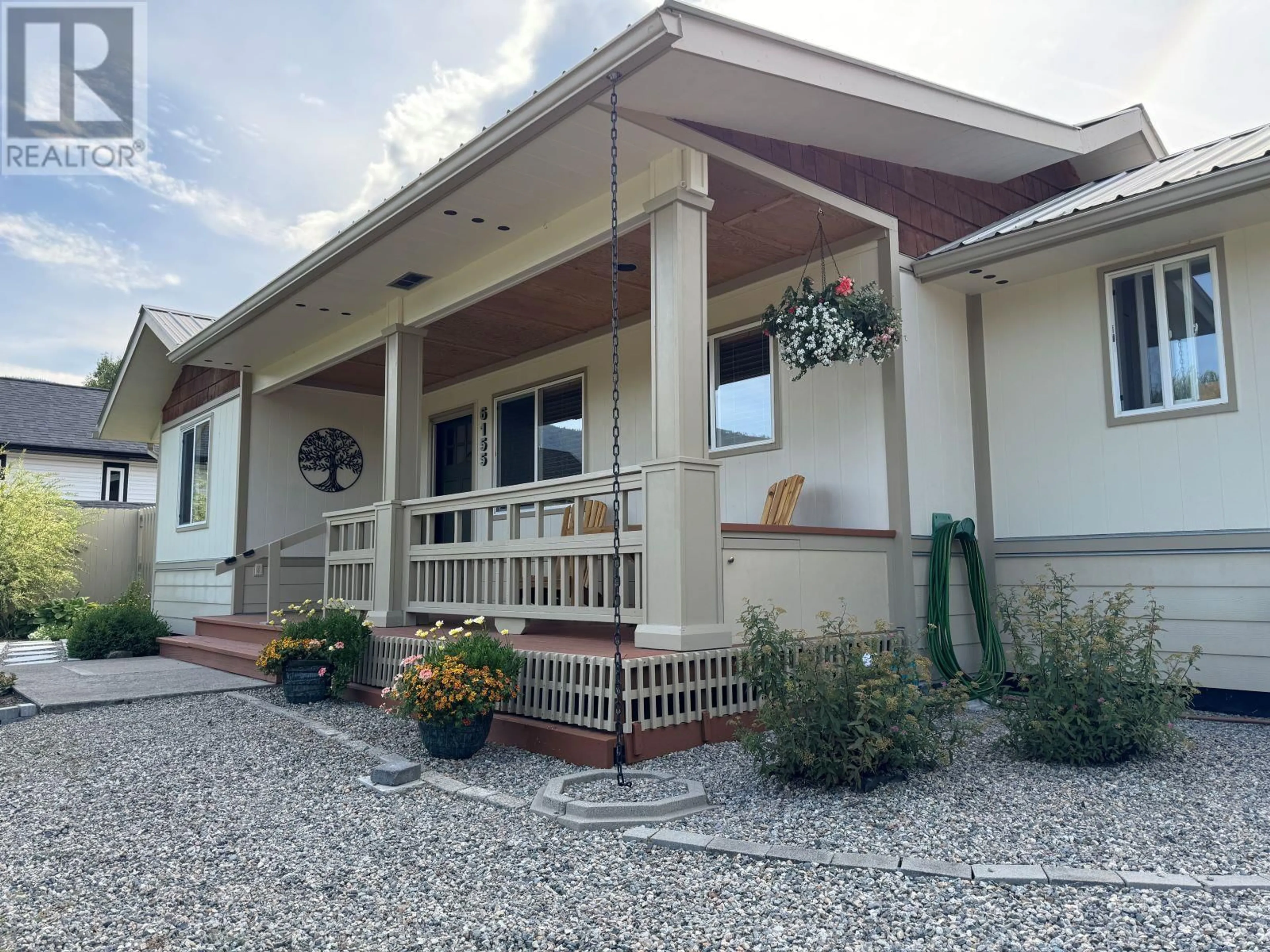 Home with vinyl exterior material, street for 6155 12TH Street, Grand Forks British Columbia V0H1H0