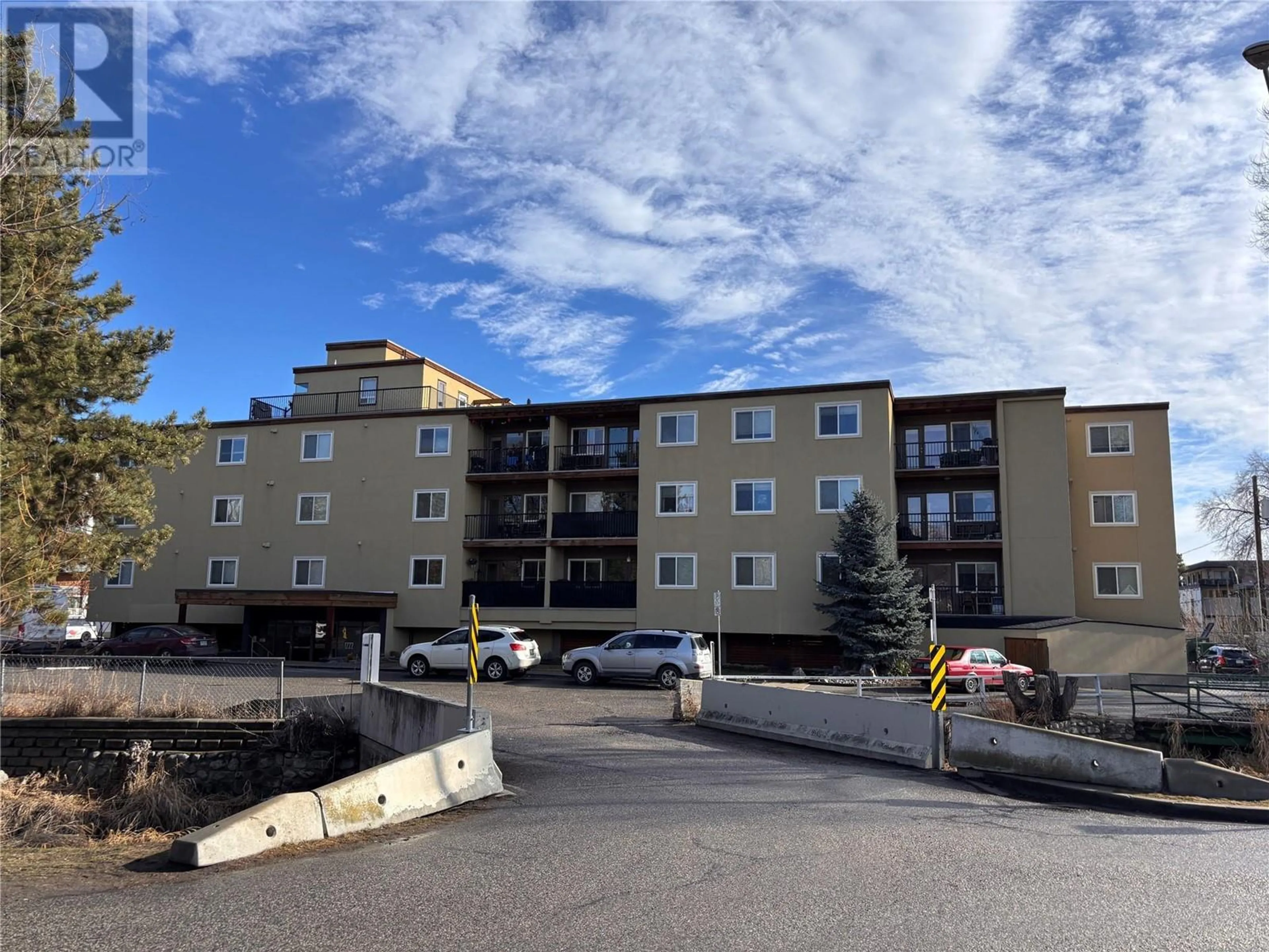 A pic from outside/outdoor area/front of a property/back of a property/a pic from drone, building for 304 - 1777 WATER STREET, Kelowna British Columbia V1Y1K4