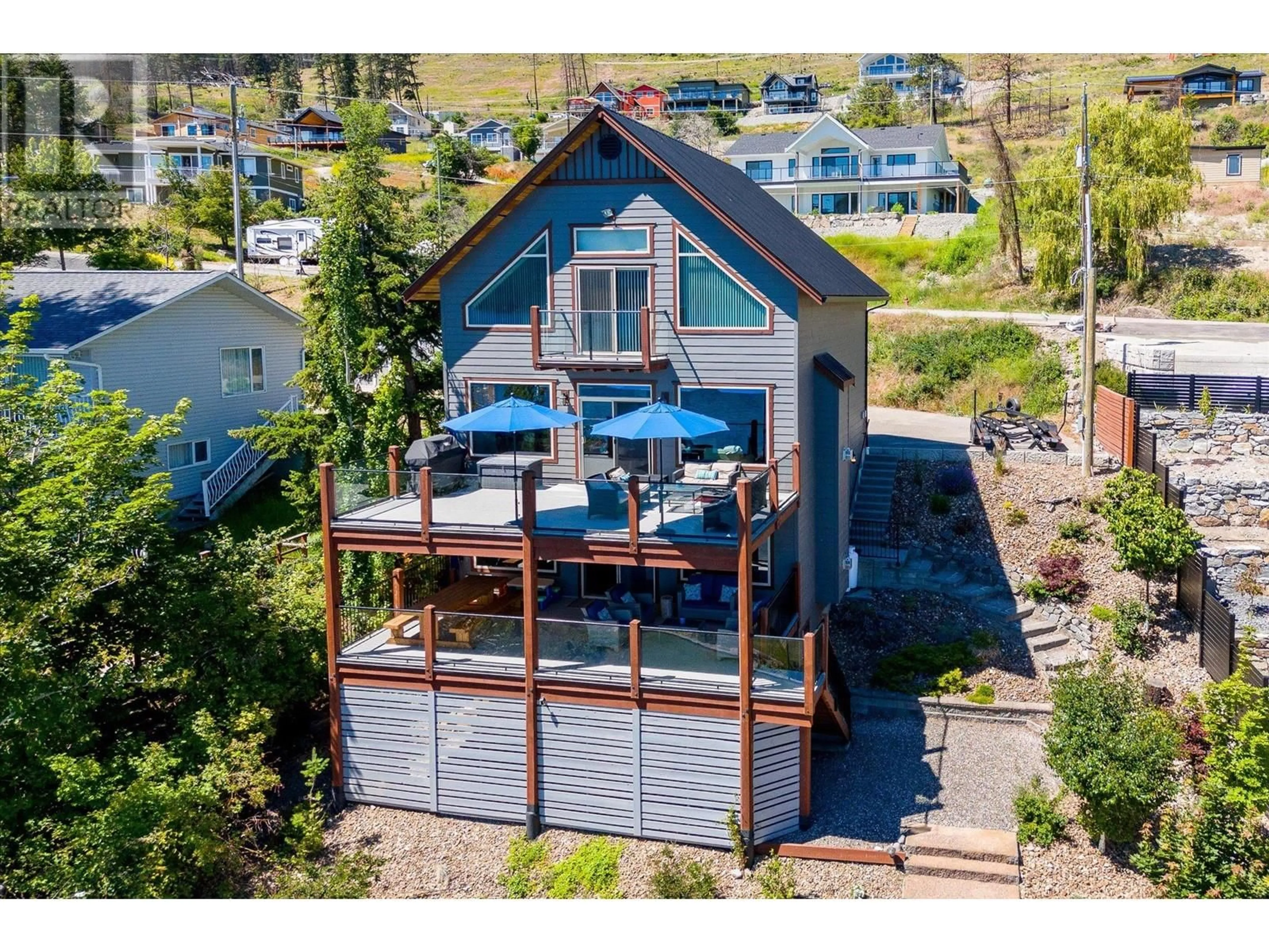A pic from outside/outdoor area/front of a property/back of a property/a pic from drone, water/lake/river/ocean view for 17 NERIE ROAD, Vernon British Columbia V1H2E4