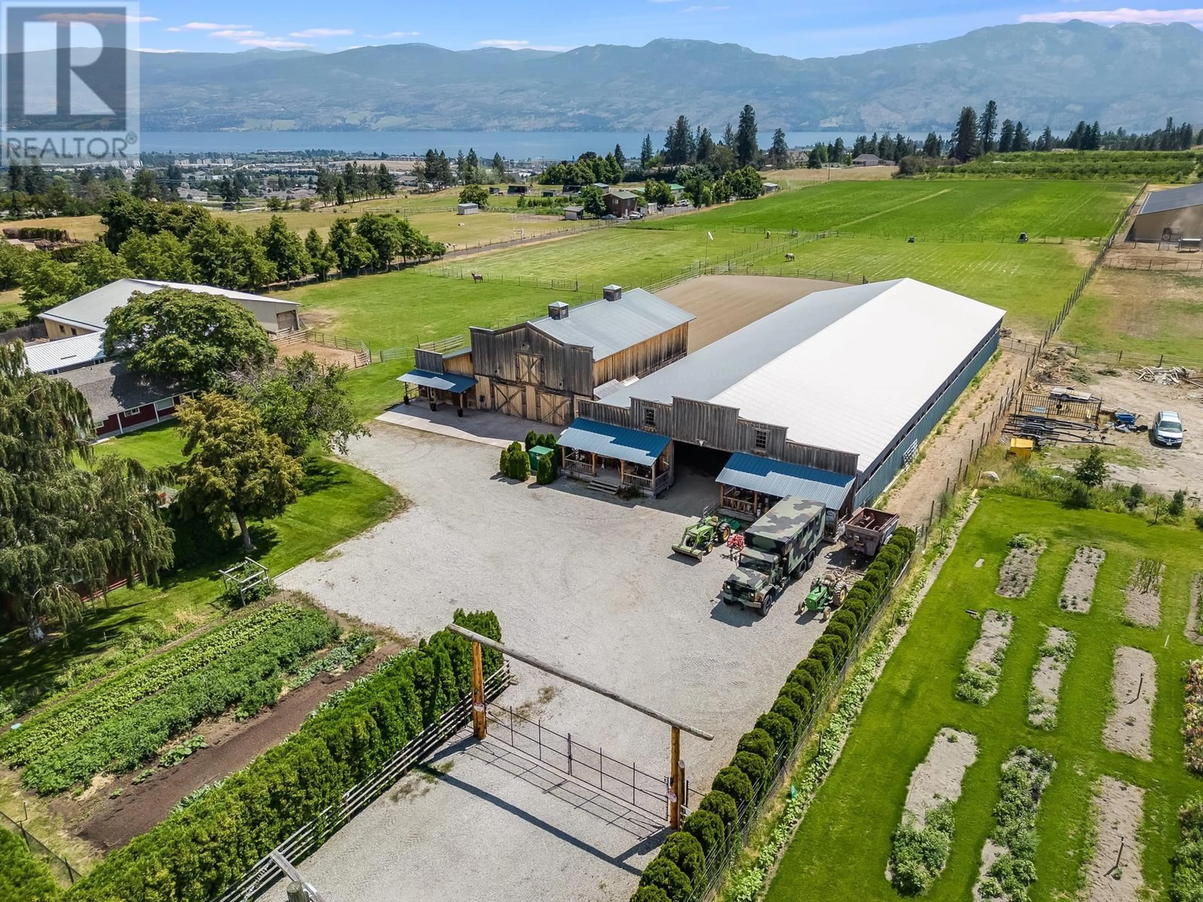 A pic from outside/outdoor area/front of a property/back of a property/a pic from drone, mountain view for 3140 Elliott Road, West Kelowna British Columbia V4T1M7