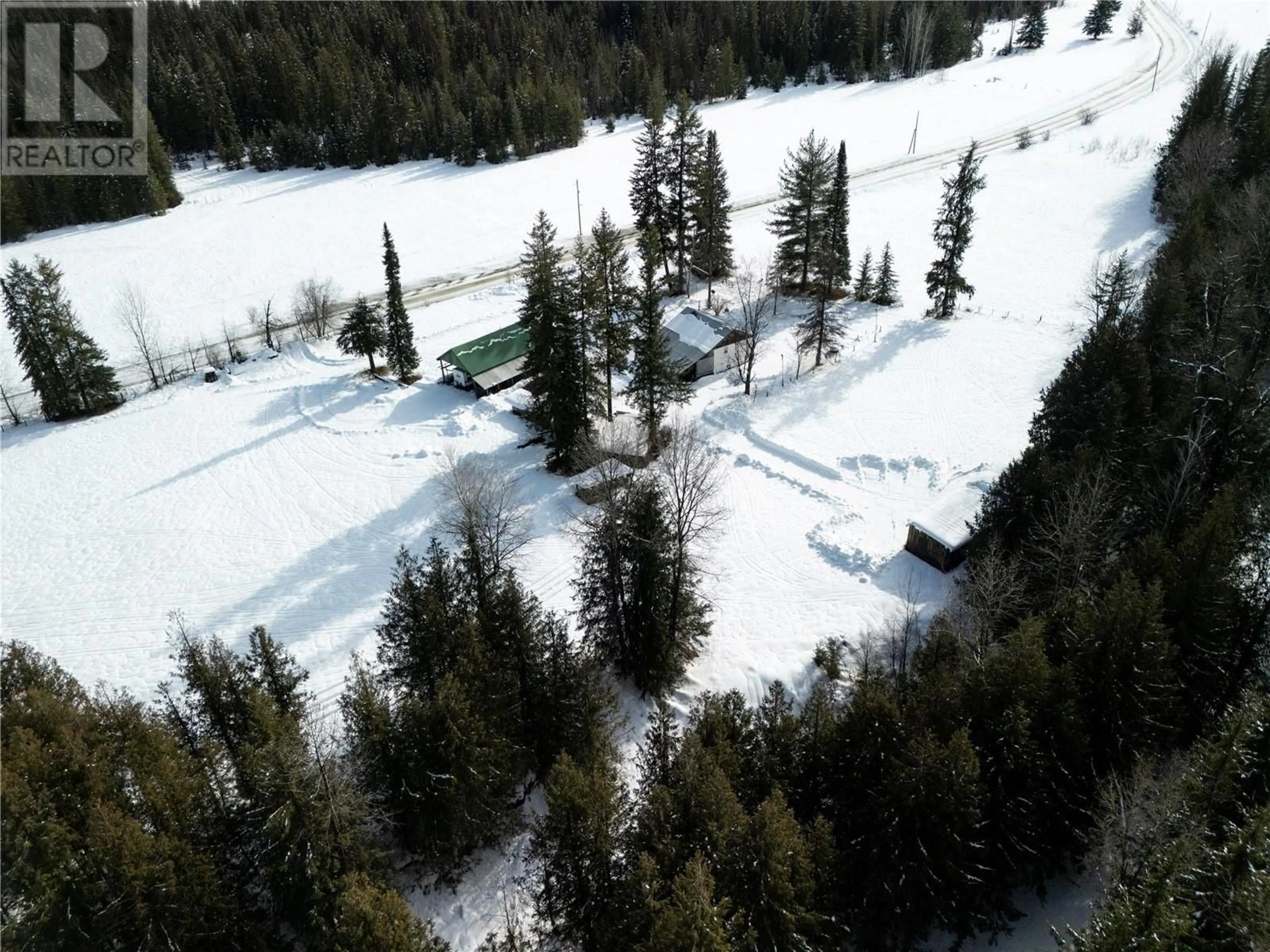 A pic from outside/outdoor area/front of a property/back of a property/a pic from drone, forest/trees view for 1440 TRINITY VALLEY ROAD, Lumby British Columbia V0E2G0