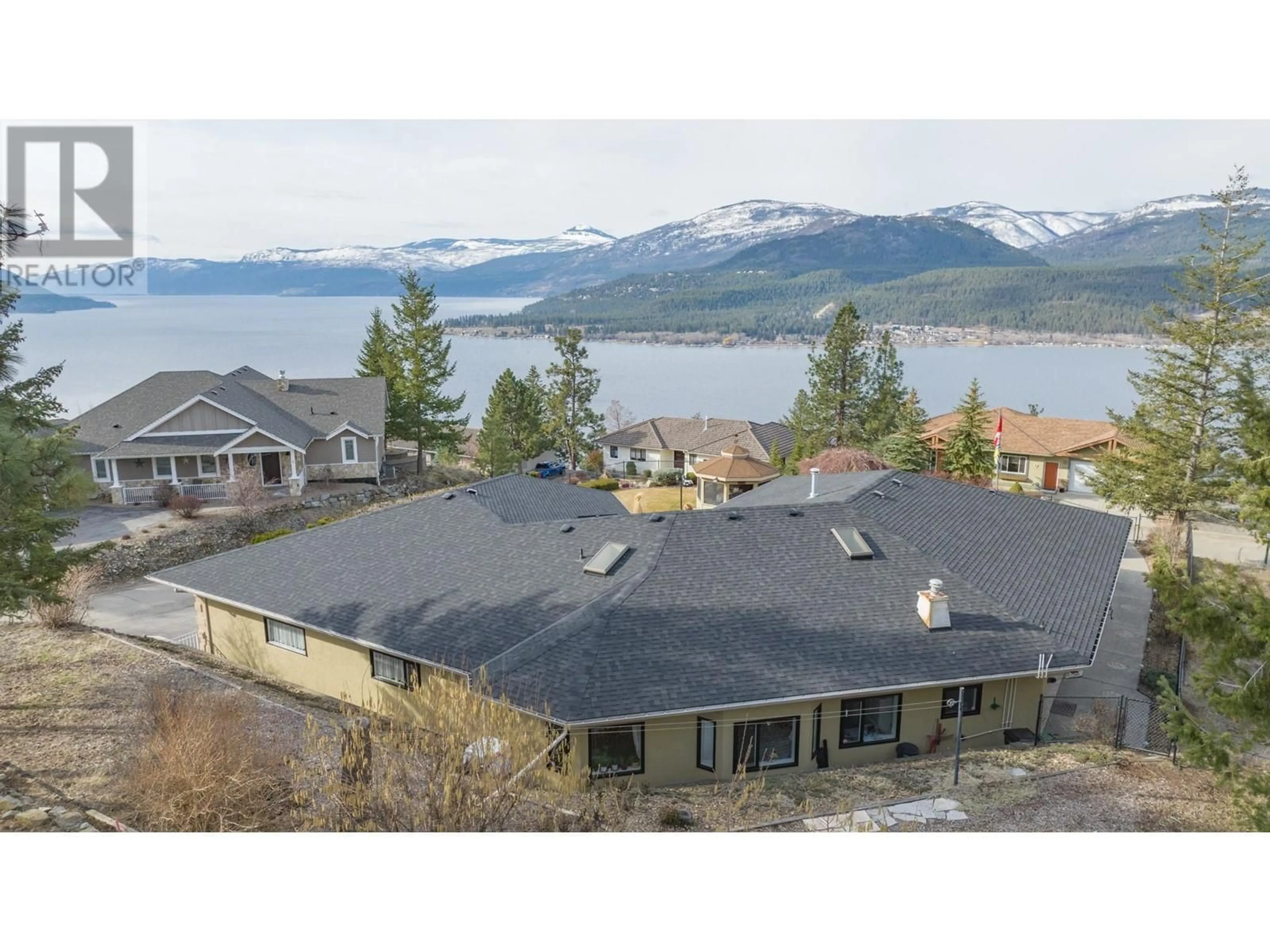 A pic from outside/outdoor area/front of a property/back of a property/a pic from drone, water/lake/river/ocean view for 6 9196 TRONSON ROAD, Vernon British Columbia V1H1E8