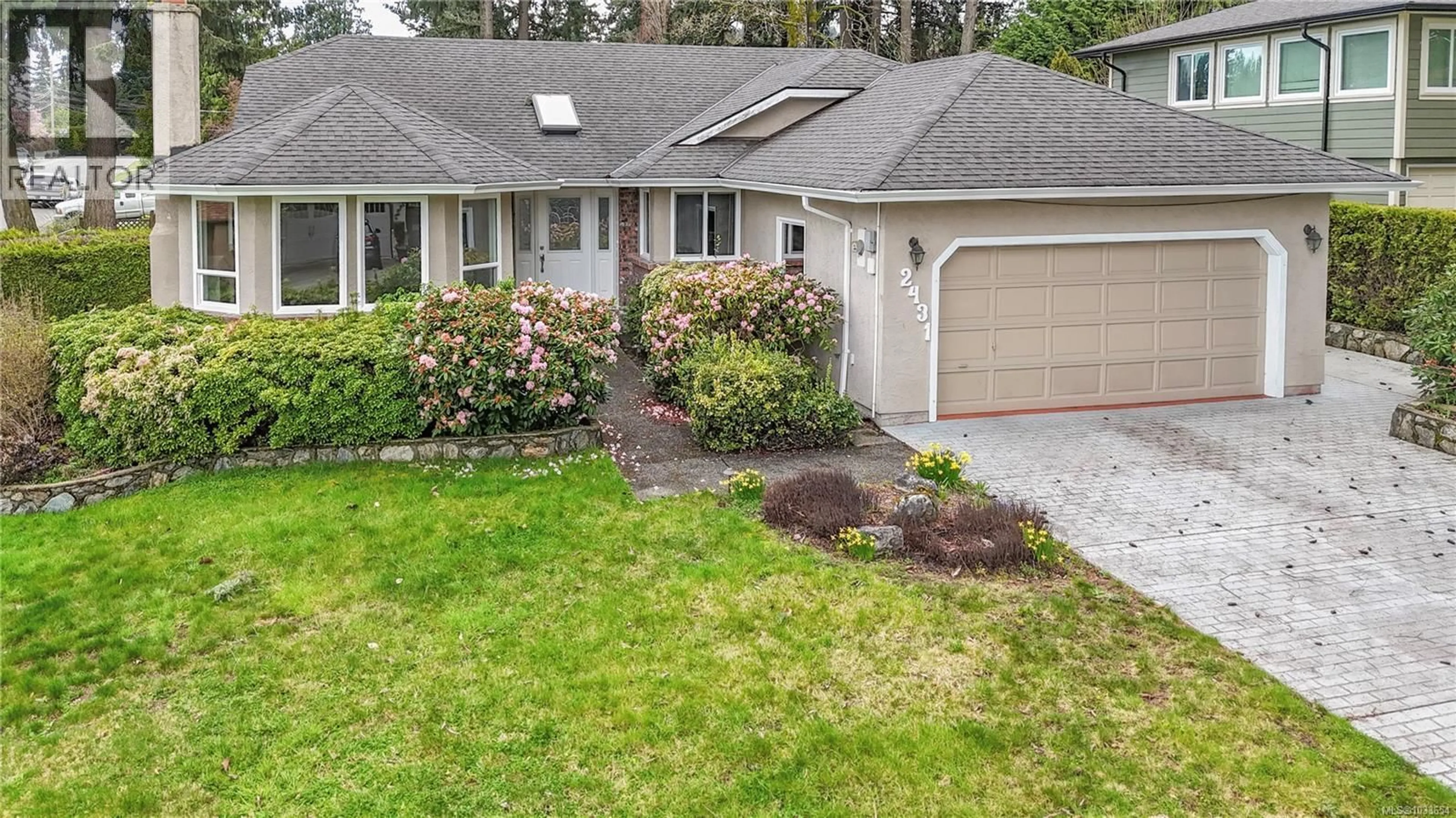 Home with vinyl exterior material, street for 2431 WILCOX TERRACE, Central Saanich British Columbia V8Z5R7