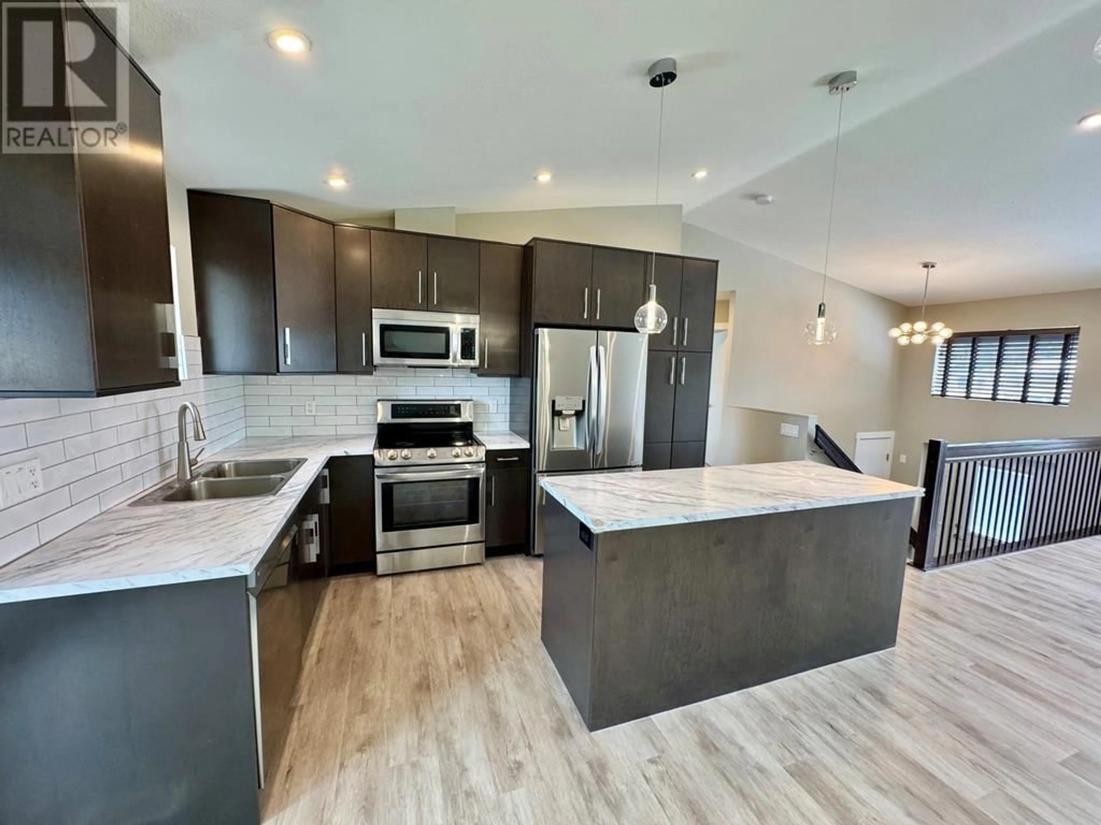 Open concept kitchen, unknown for 11104 15 Street, Dawson Creek British Columbia V1G3Z4