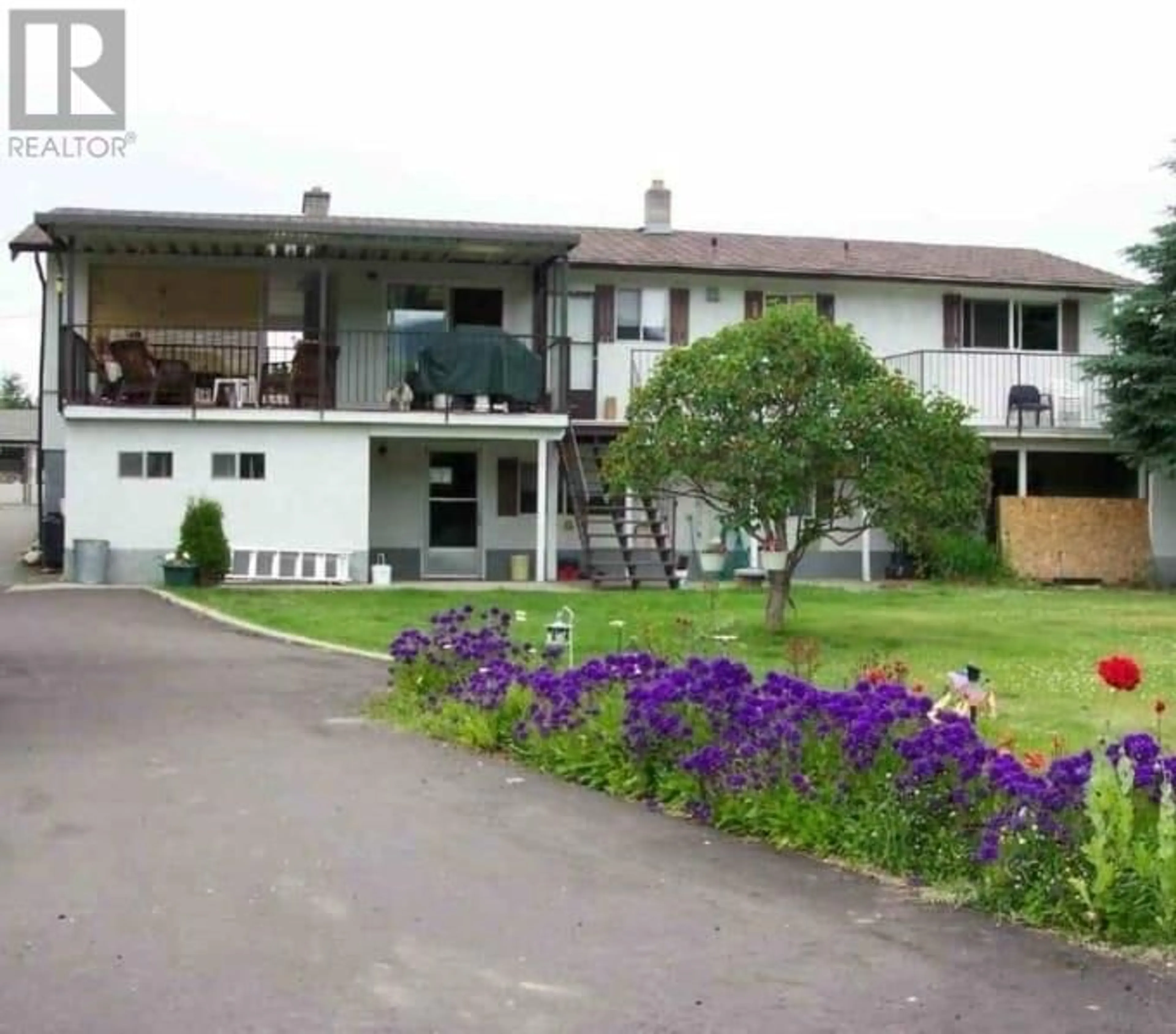 A pic from outside/outdoor area/front of a property/back of a property/a pic from drone, unknown for 195 RAINS ROAD, Kelowna British Columbia V1X4R5