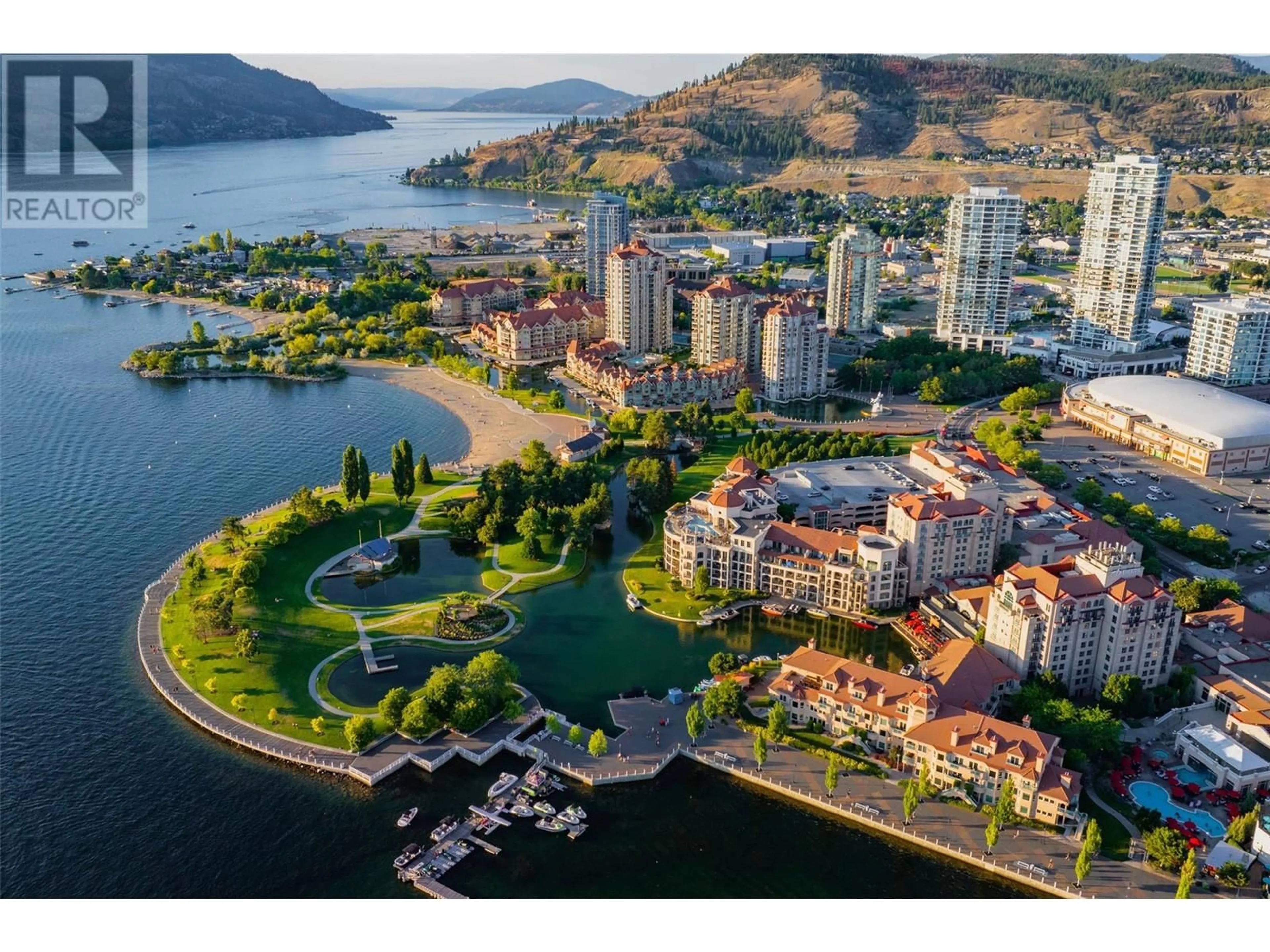 A pic from outside/outdoor area/front of a property/back of a property/a pic from drone, water/lake/river/ocean view for 334 - 1088 SUNSET DRIVE, Kelowna British Columbia V1Y9W1