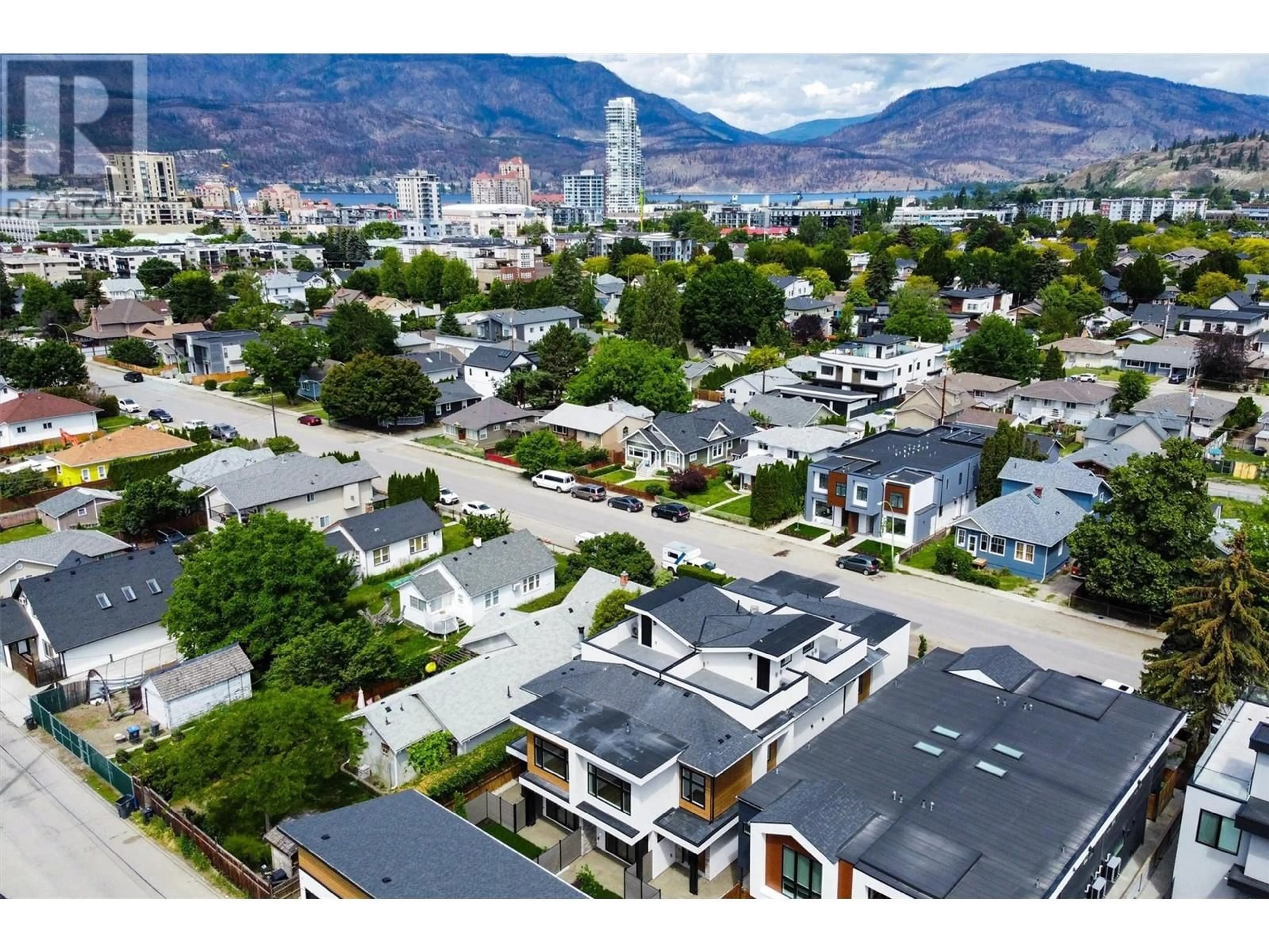 A pic from outside/outdoor area/front of a property/back of a property/a pic from drone, mountain view for 3 - 839 LAWSON AVENUE, Kelowna British Columbia V1Y6S9