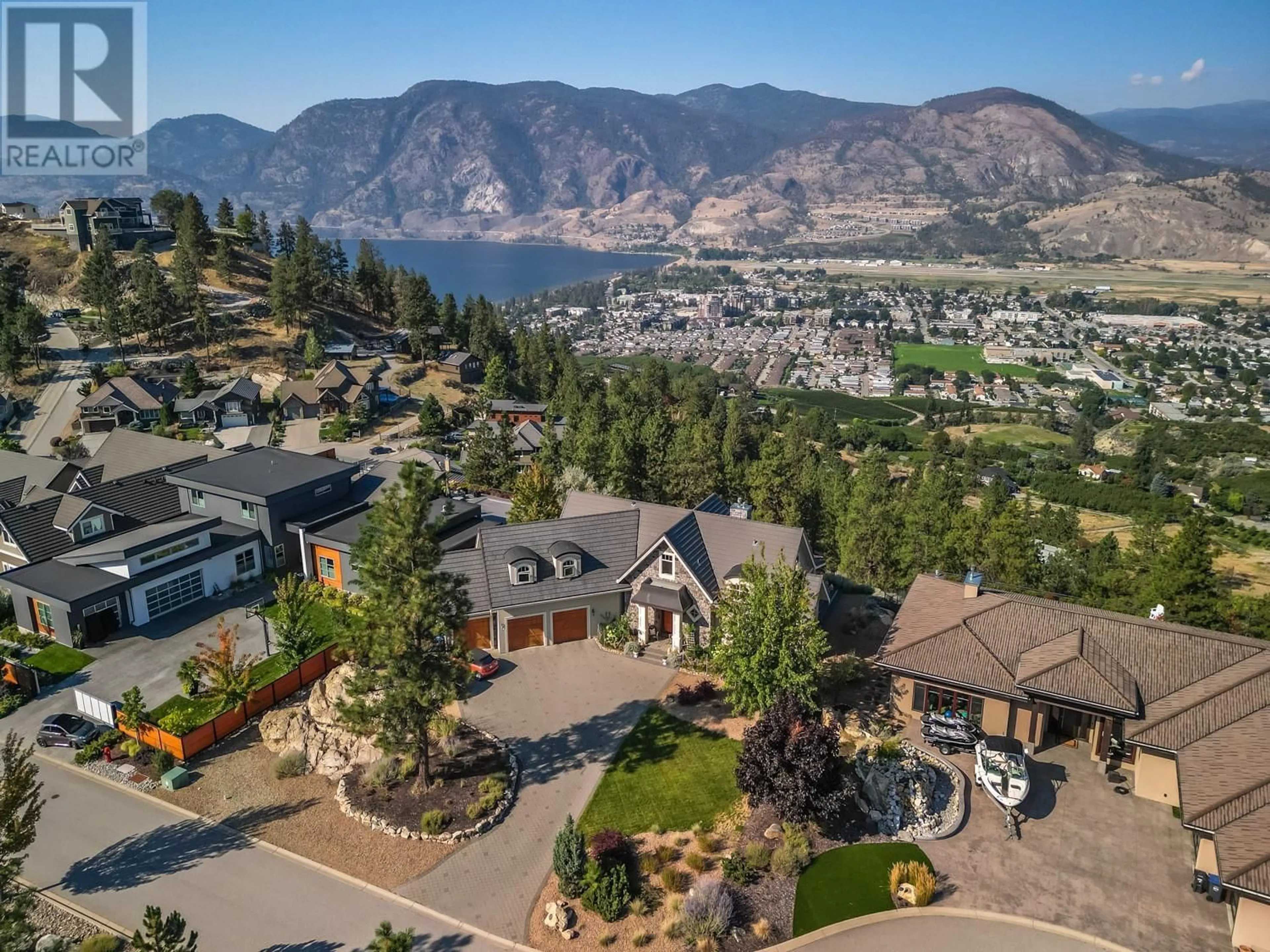 A pic from outside/outdoor area/front of a property/back of a property/a pic from drone, mountain view for 112 Penrose Court Unit# 6, Penticton British Columbia V2A9B6