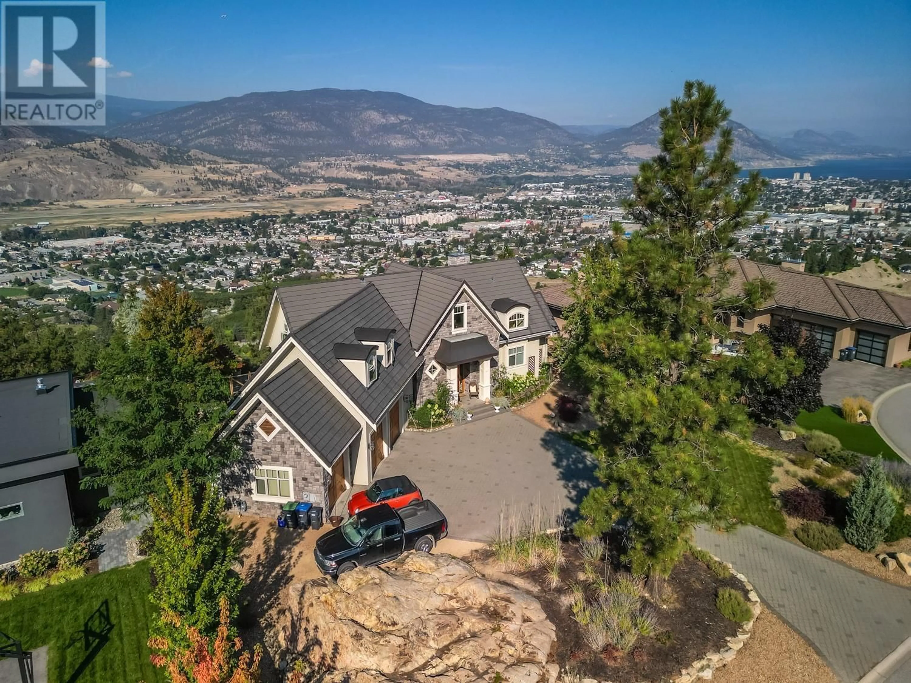 A pic from outside/outdoor area/front of a property/back of a property/a pic from drone, mountain view for 112 Penrose Court Unit# 6, Penticton British Columbia V2A9B6