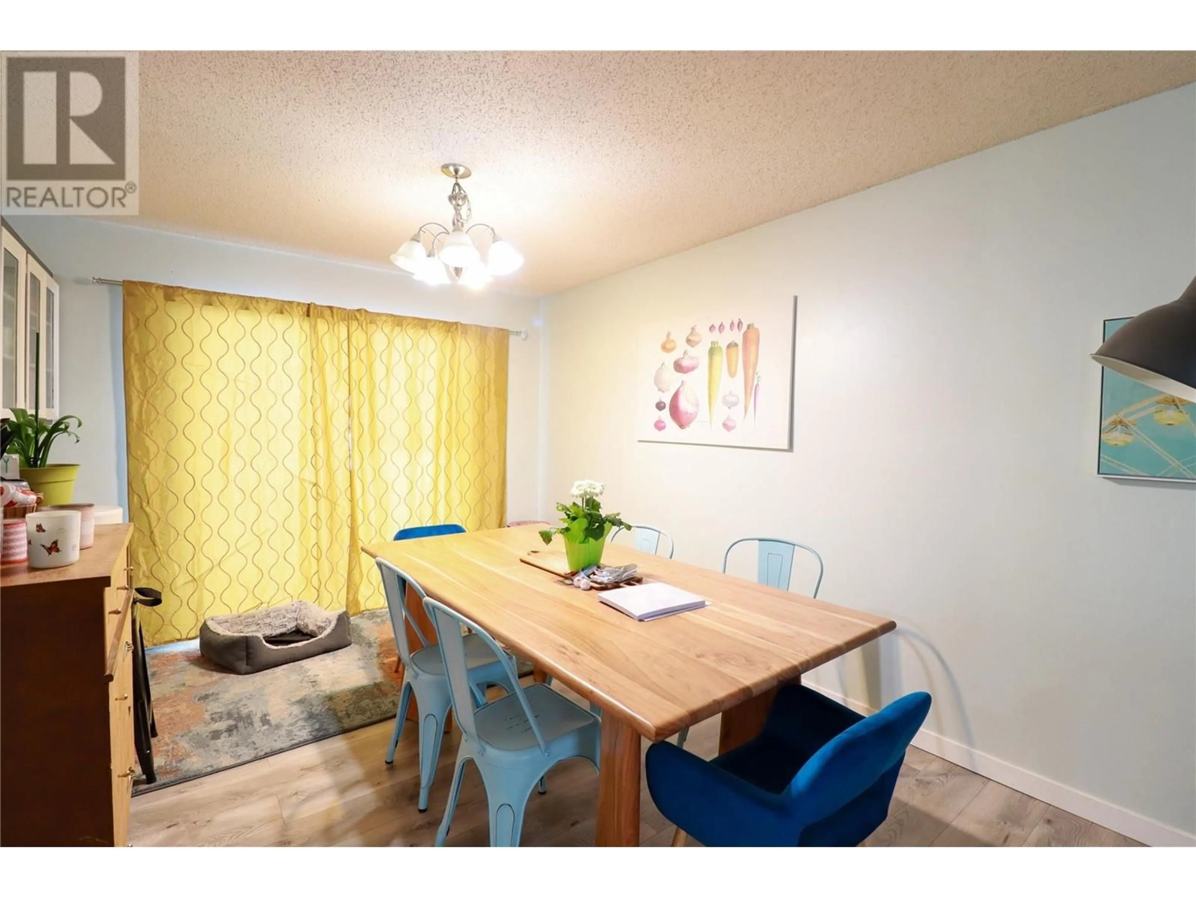 Dining room, wood/laminate floor for 12115 MARSHALL CRESCENT, Summerland British Columbia V0H1Z5