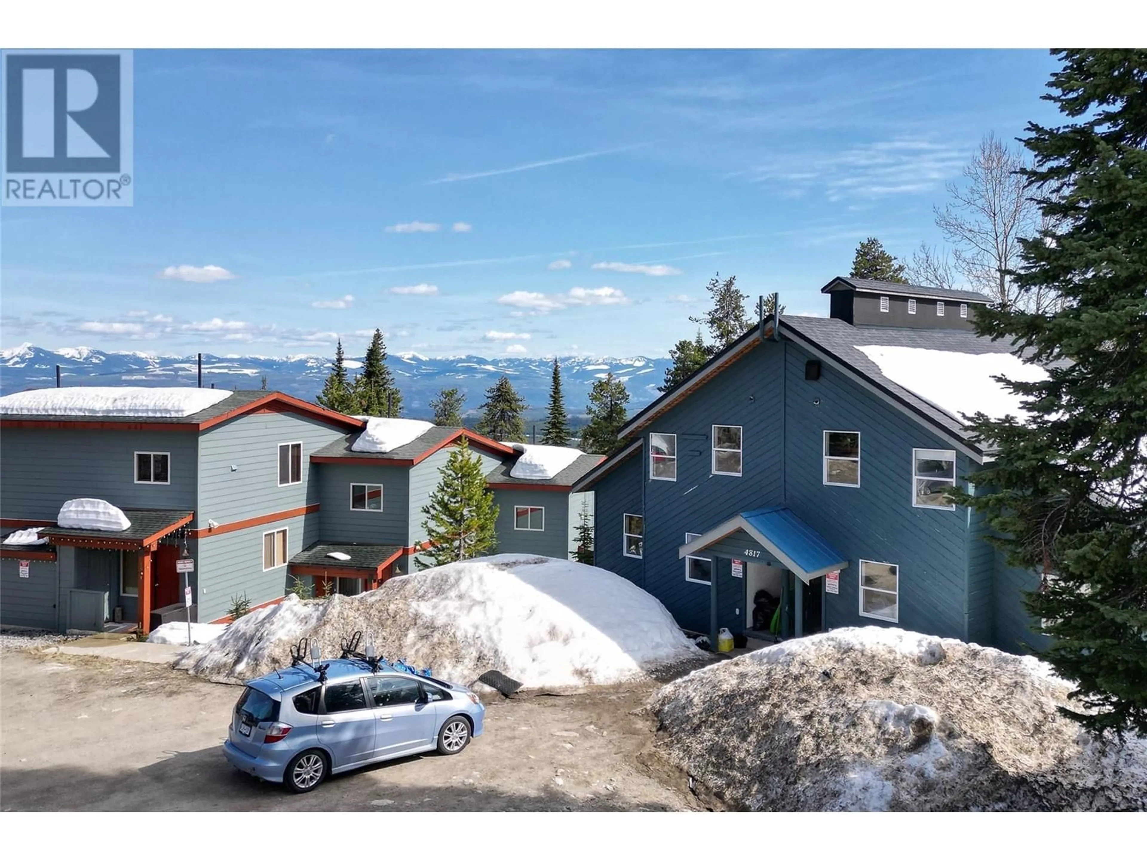 A pic from outside/outdoor area/front of a property/back of a property/a pic from drone, mountain view for D - 4817 SNOW PINES ROAD, Big White British Columbia V1P1P3